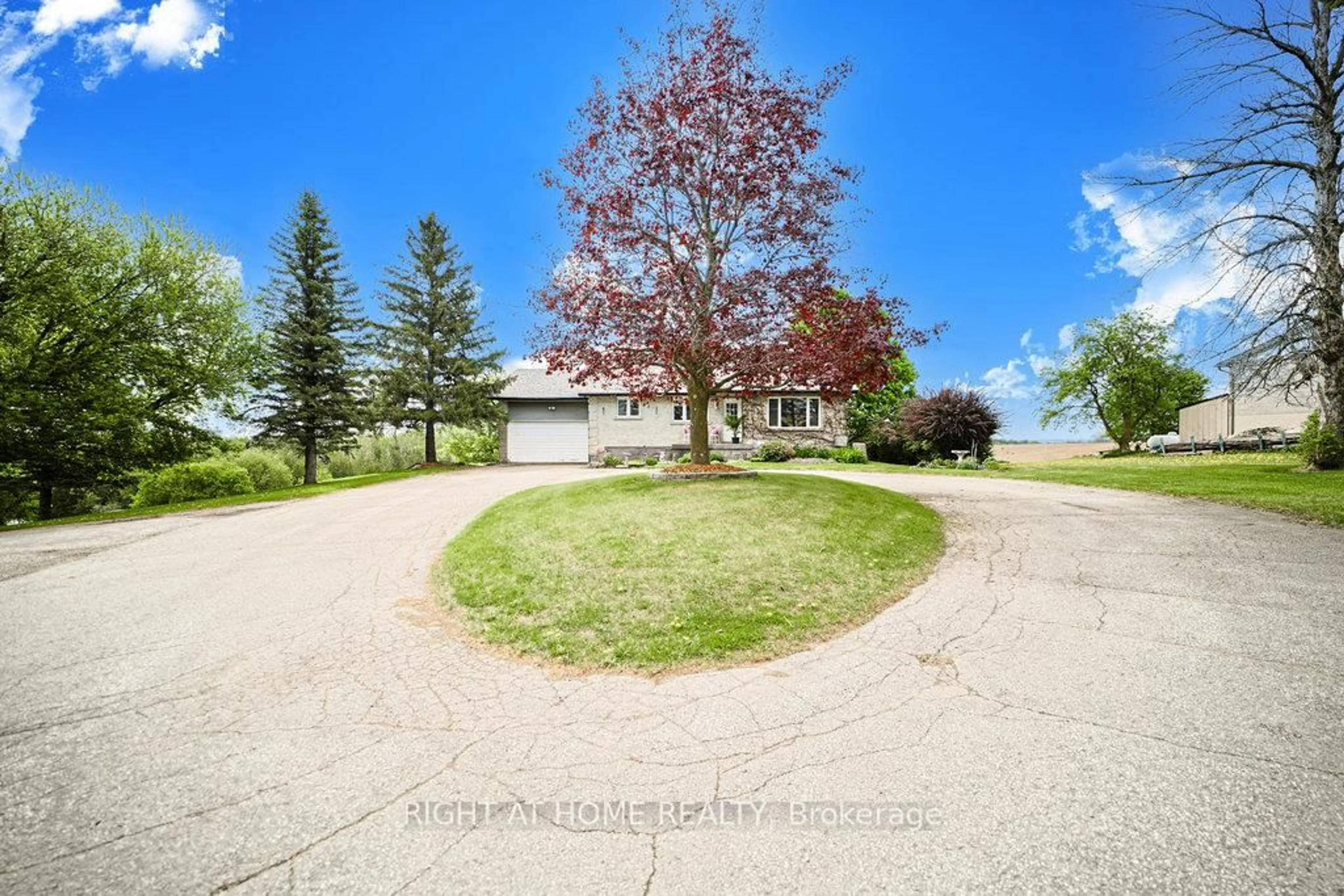 A pic from outside/outdoor area/front of a property/back of a property/a pic from drone, street for 5909 13th Line, New Tecumseth Ontario L0L 1L0