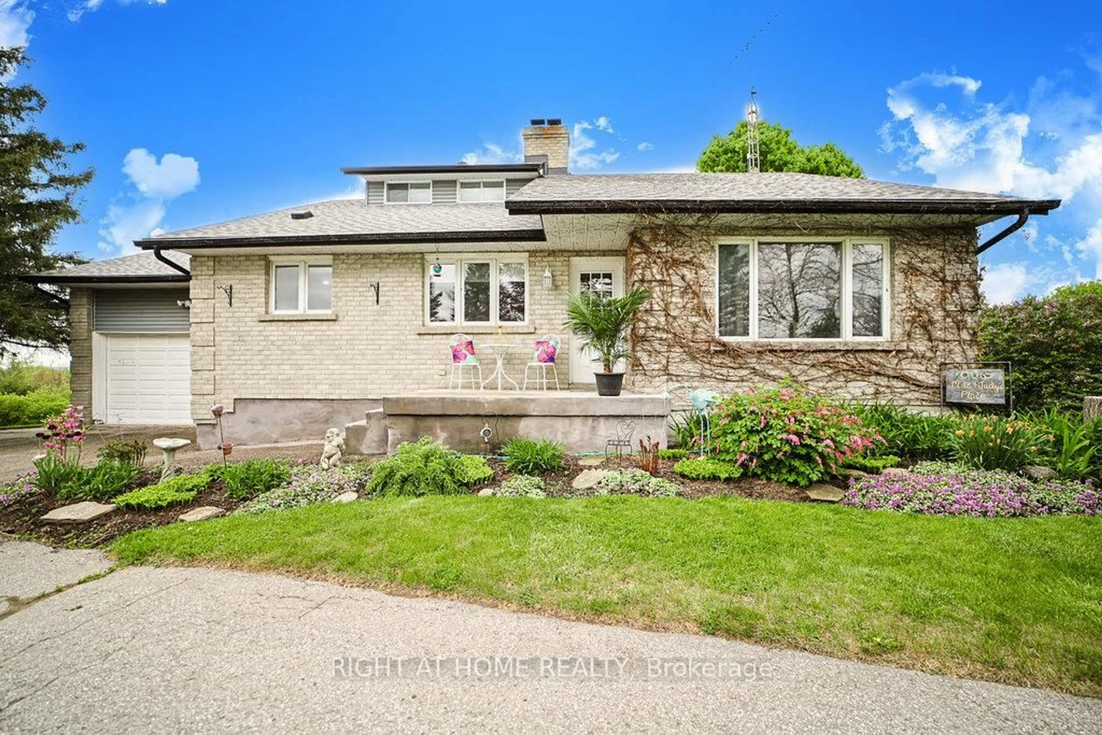 Home with brick exterior material, street for 5909 13th Line, New Tecumseth Ontario L0L 1L0