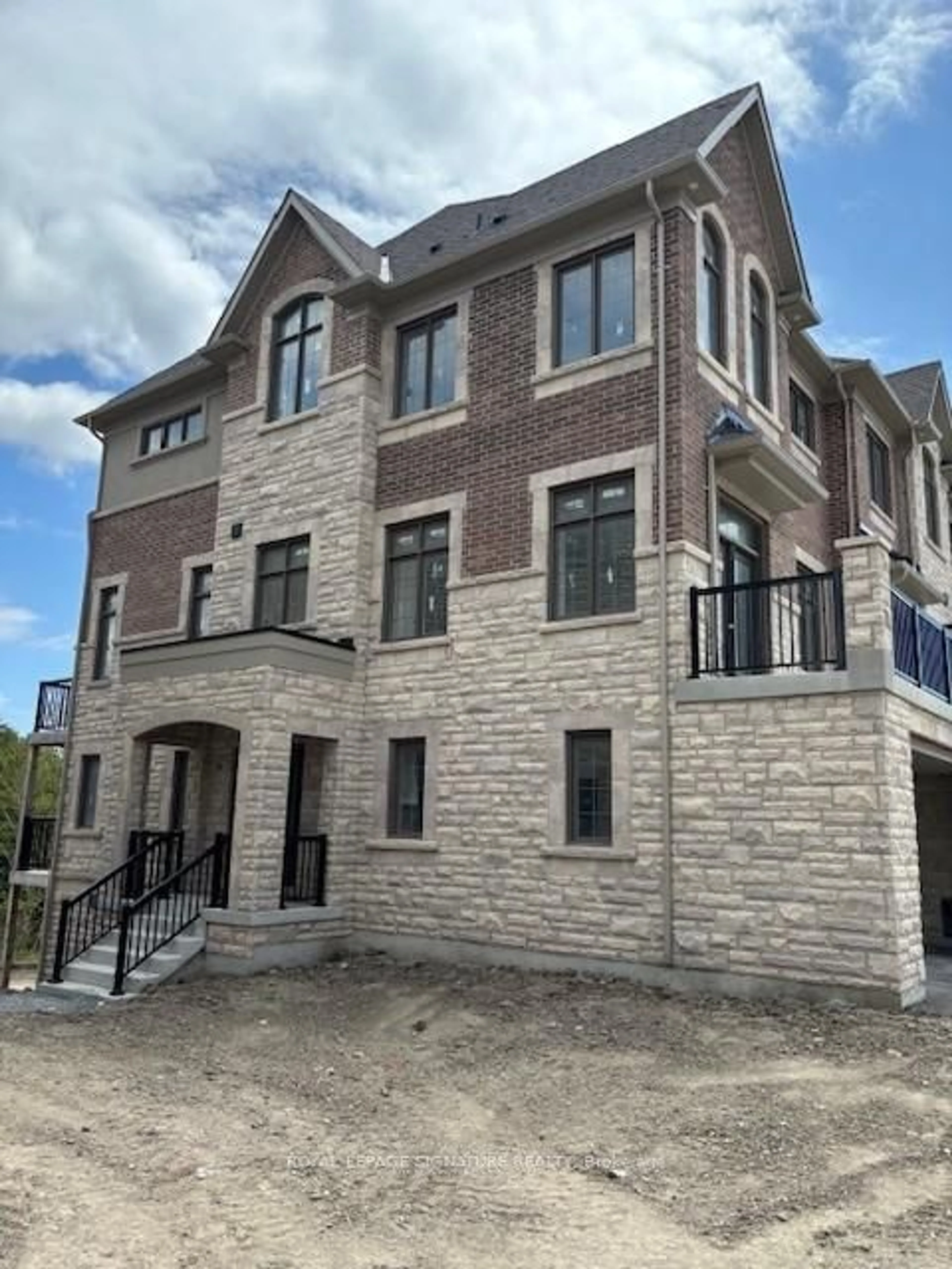 Home with brick exterior material, building for 87 West Village Lane, Markham Ontario L6C 3L5