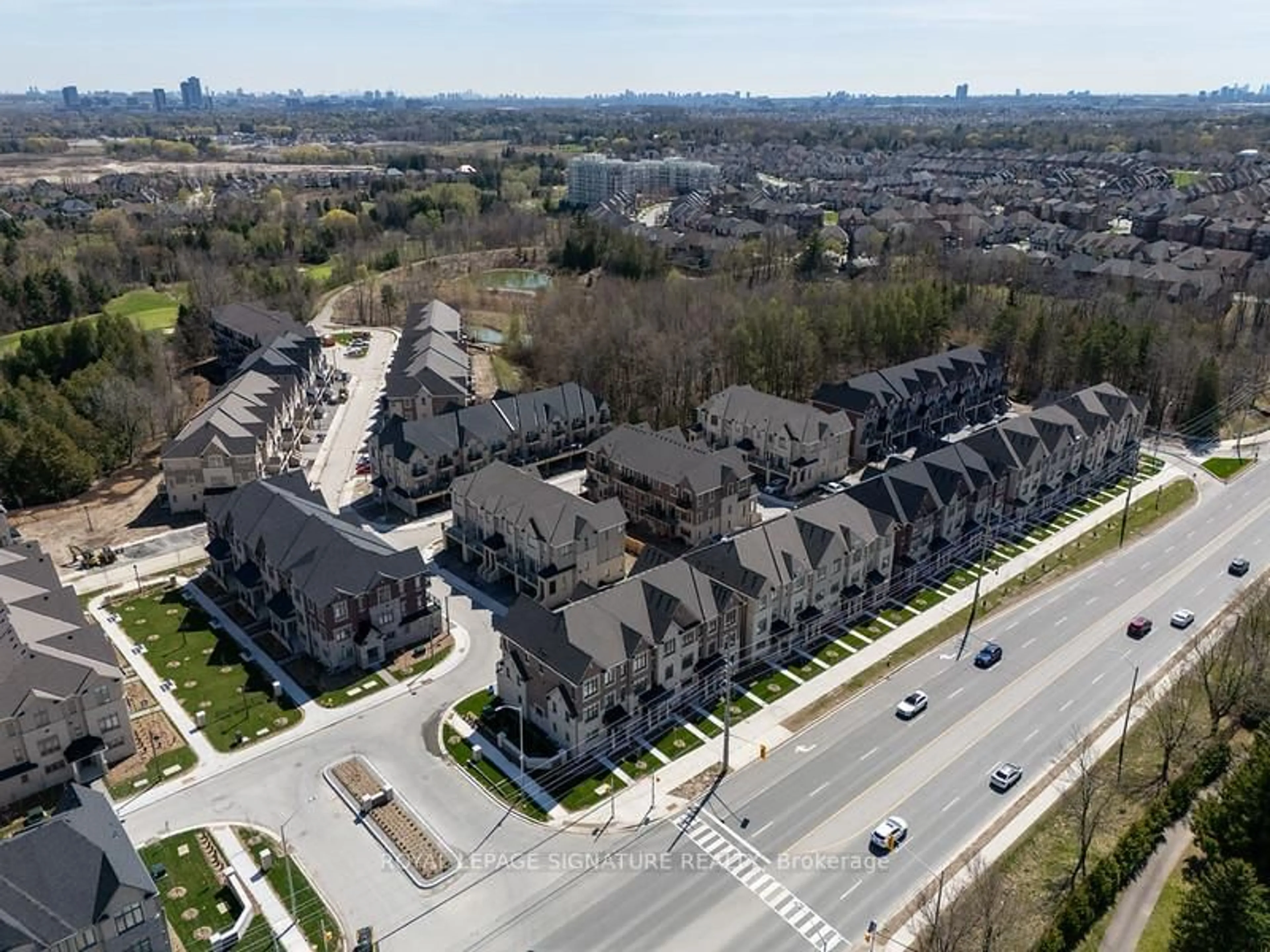 A pic from outside/outdoor area/front of a property/back of a property/a pic from drone, street for 87 West Village Lane, Markham Ontario L6C 3L5