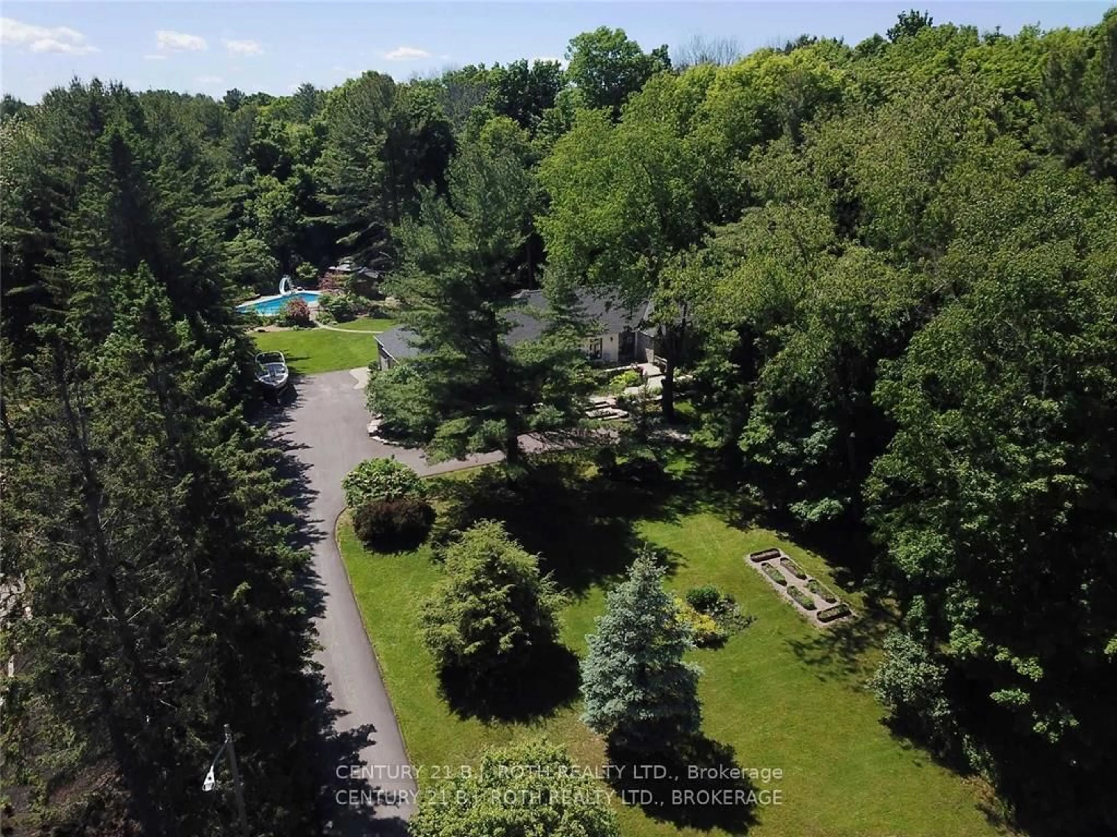 A pic from outside/outdoor area/front of a property/back of a property/a pic from drone, forest/trees view for 3274 Liah Lane, Innisfil Ontario L9S 2B4