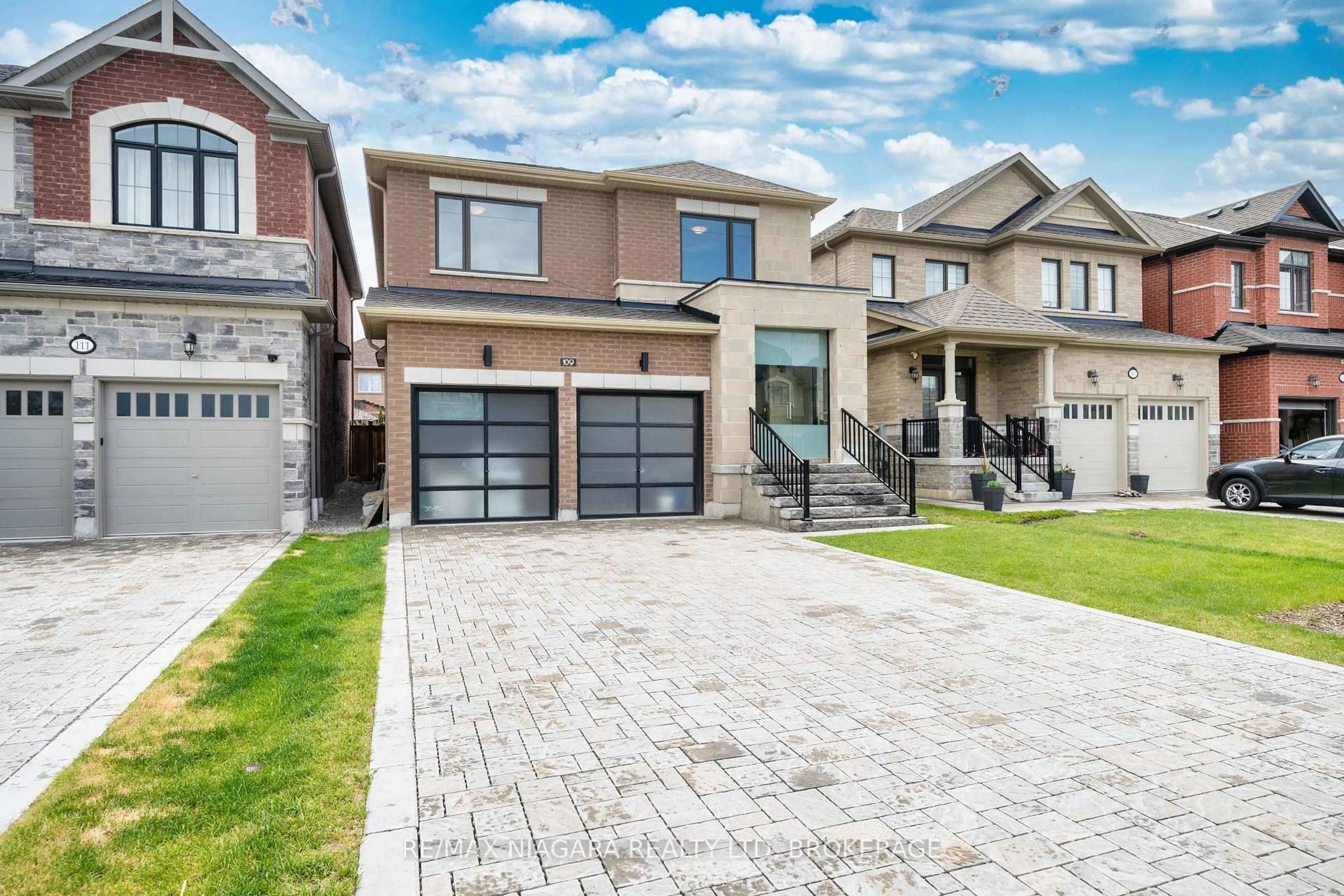Home with brick exterior material, street for 109 Jinnah Ave, Markham Ontario L3S 0G4
