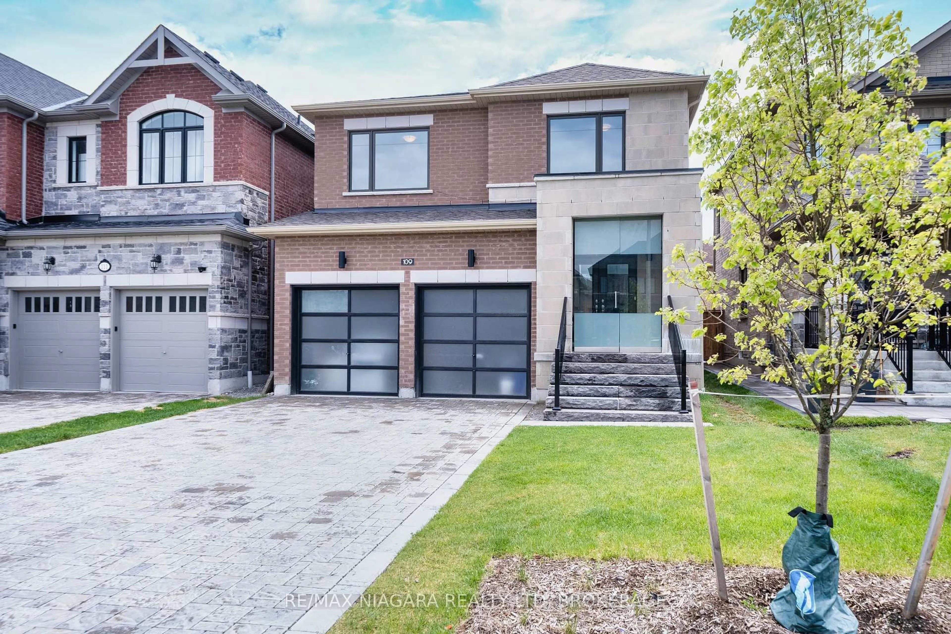 Home with brick exterior material, street for 109 Jinnah Ave, Markham Ontario L3S 0G4