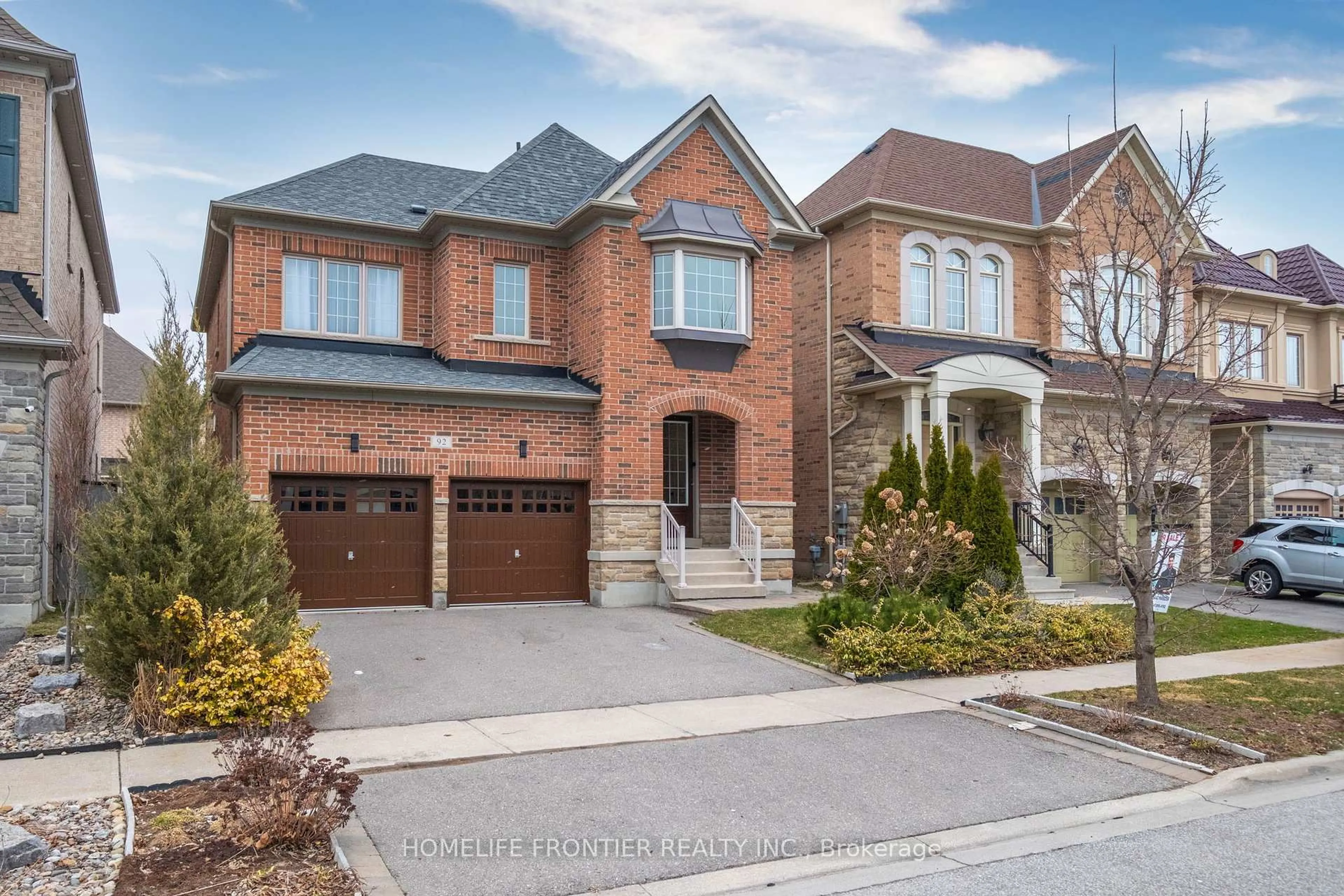 Home with brick exterior material, street for 92 Wardlaw Pl, Vaughan Ontario L4H 0Z9