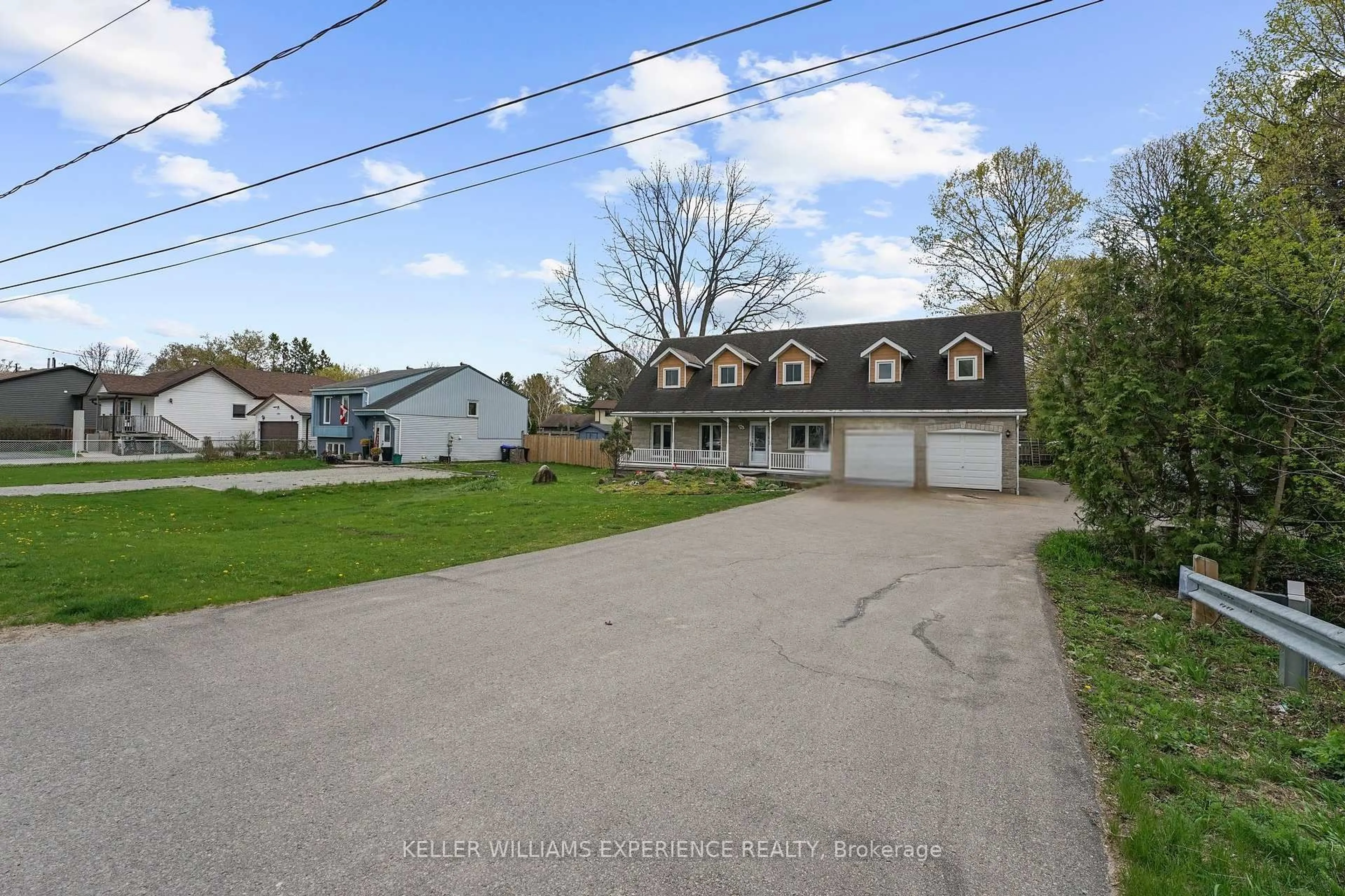 A pic from outside/outdoor area/front of a property/back of a property/a pic from drone, street for 190 Centre St, Essa Ontario L0M 1B0