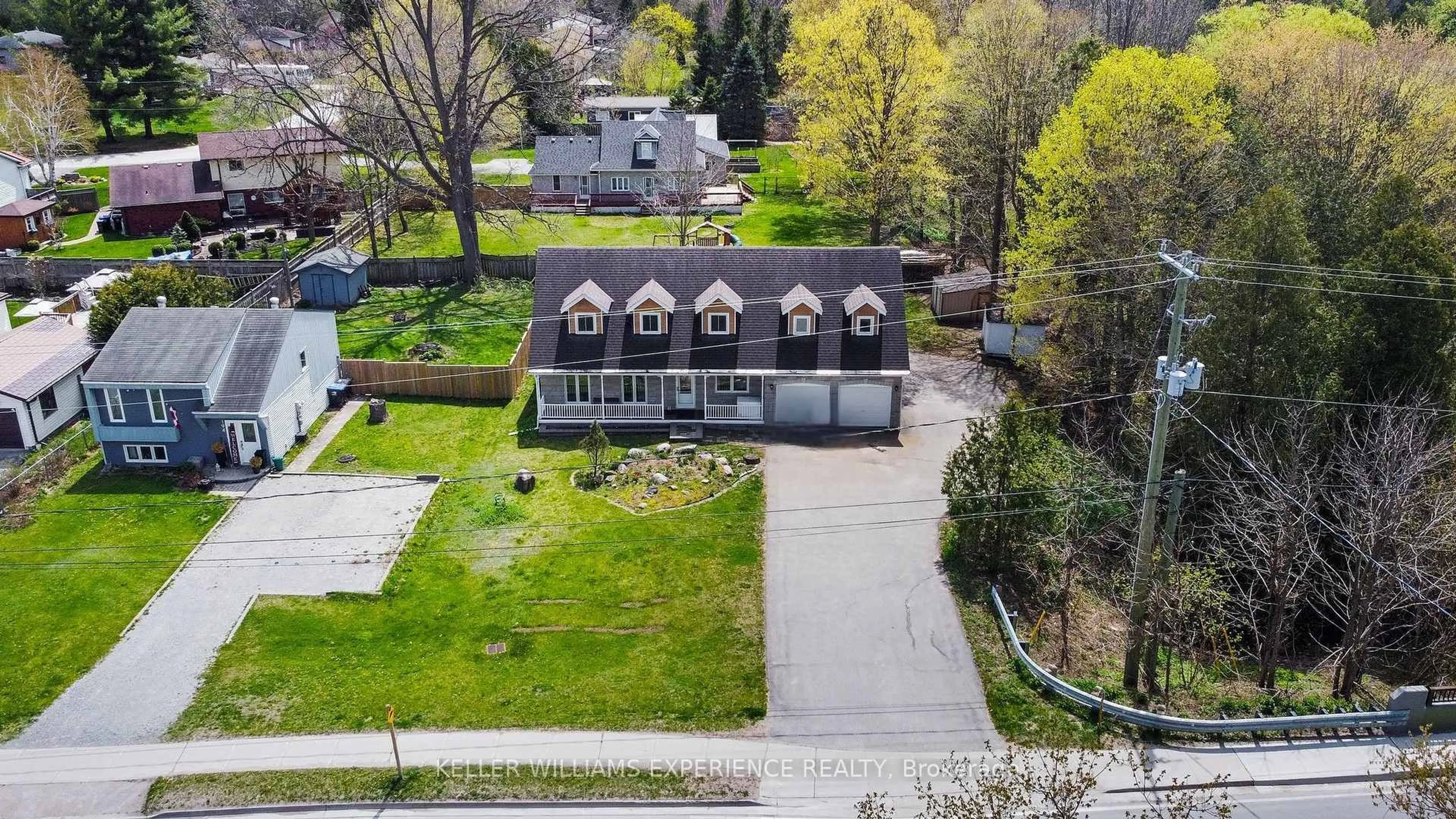 A pic from outside/outdoor area/front of a property/back of a property/a pic from drone, street for 190 Centre St, Essa Ontario L0M 1B0