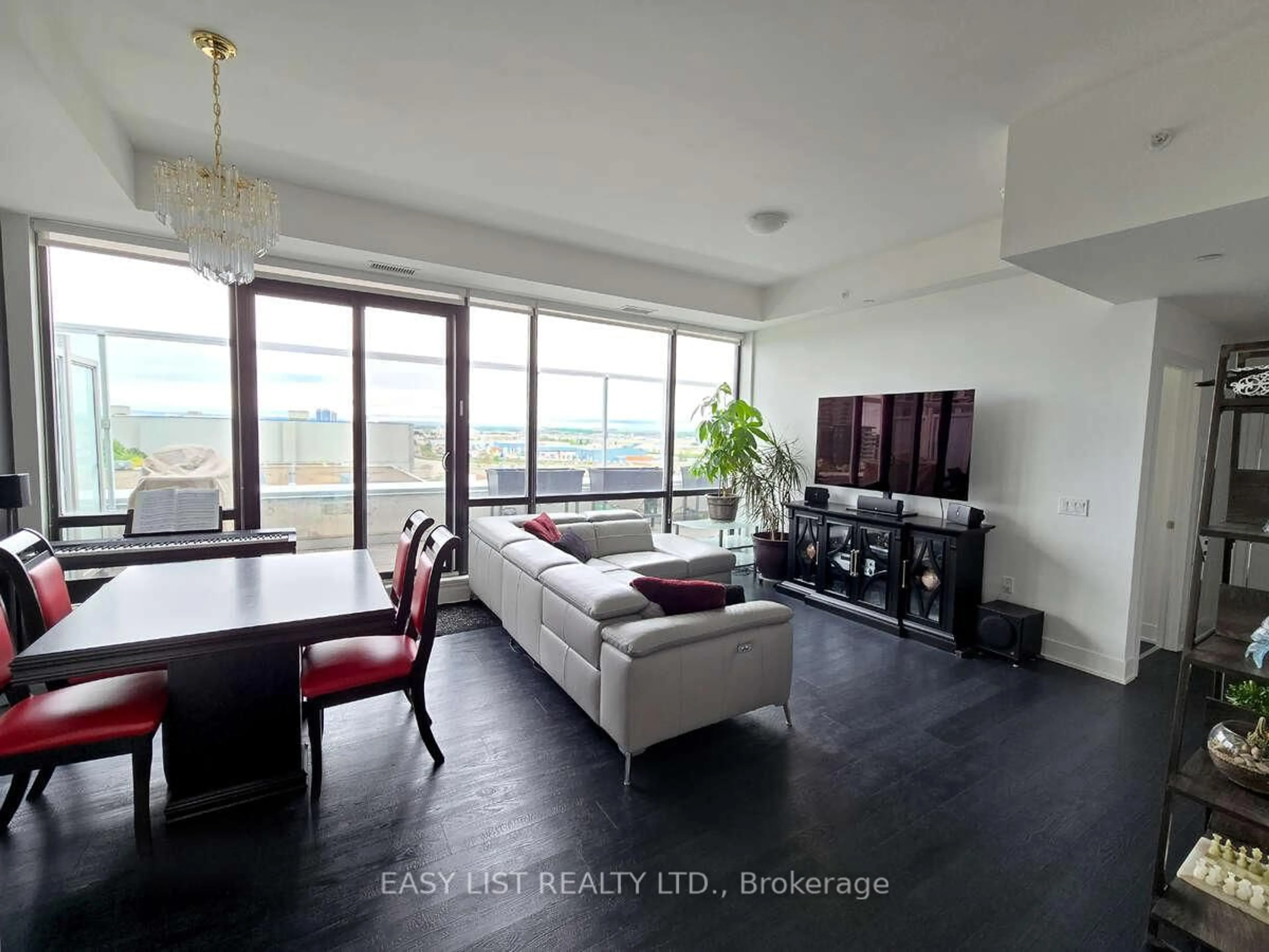 Living room with furniture, unknown for 2908 Highway 7 N/A #616E, Vaughan Ontario L4K 0K5