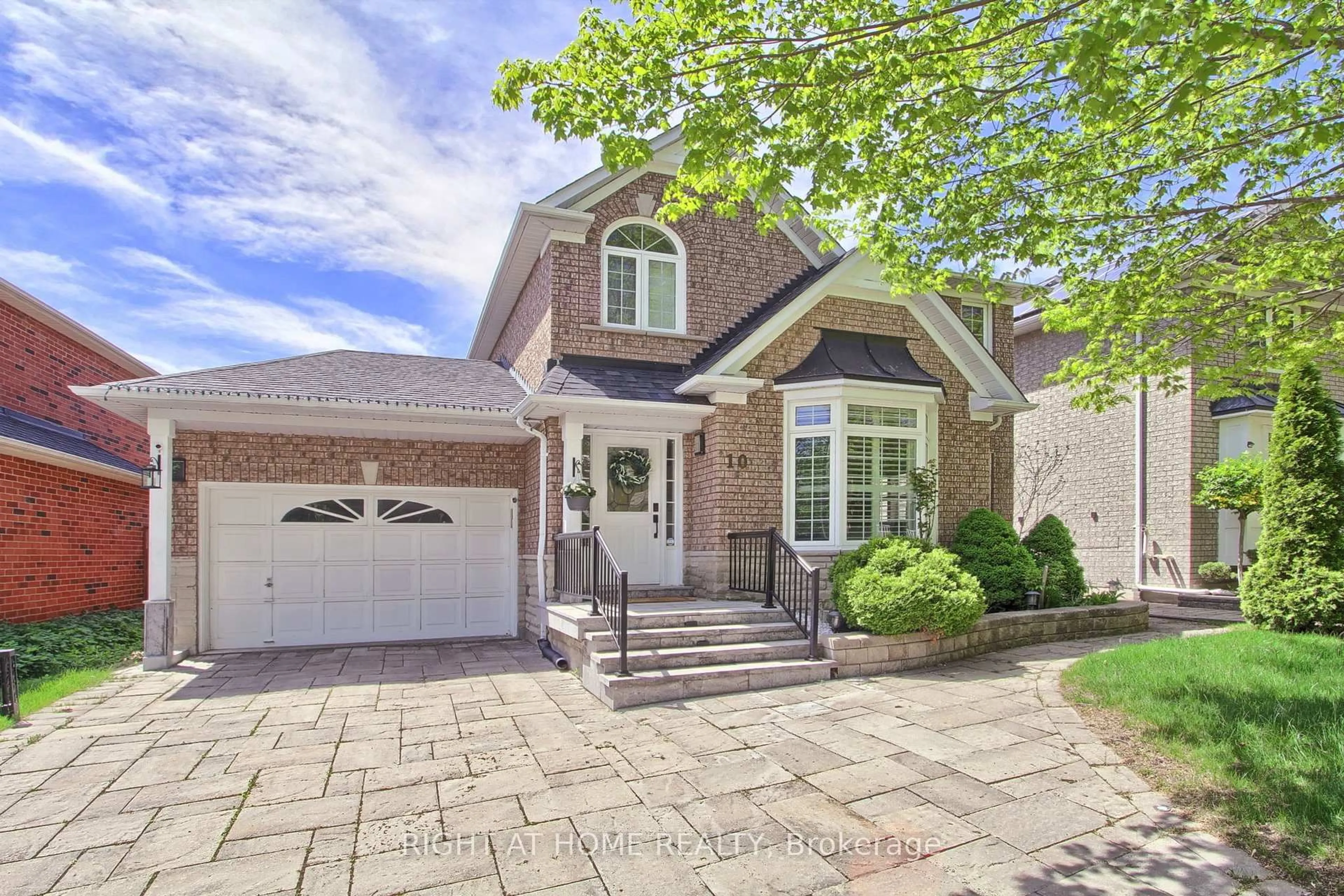 Home with brick exterior material, street for 10 Juneberry Ave, Markham Ontario L3S 4B1