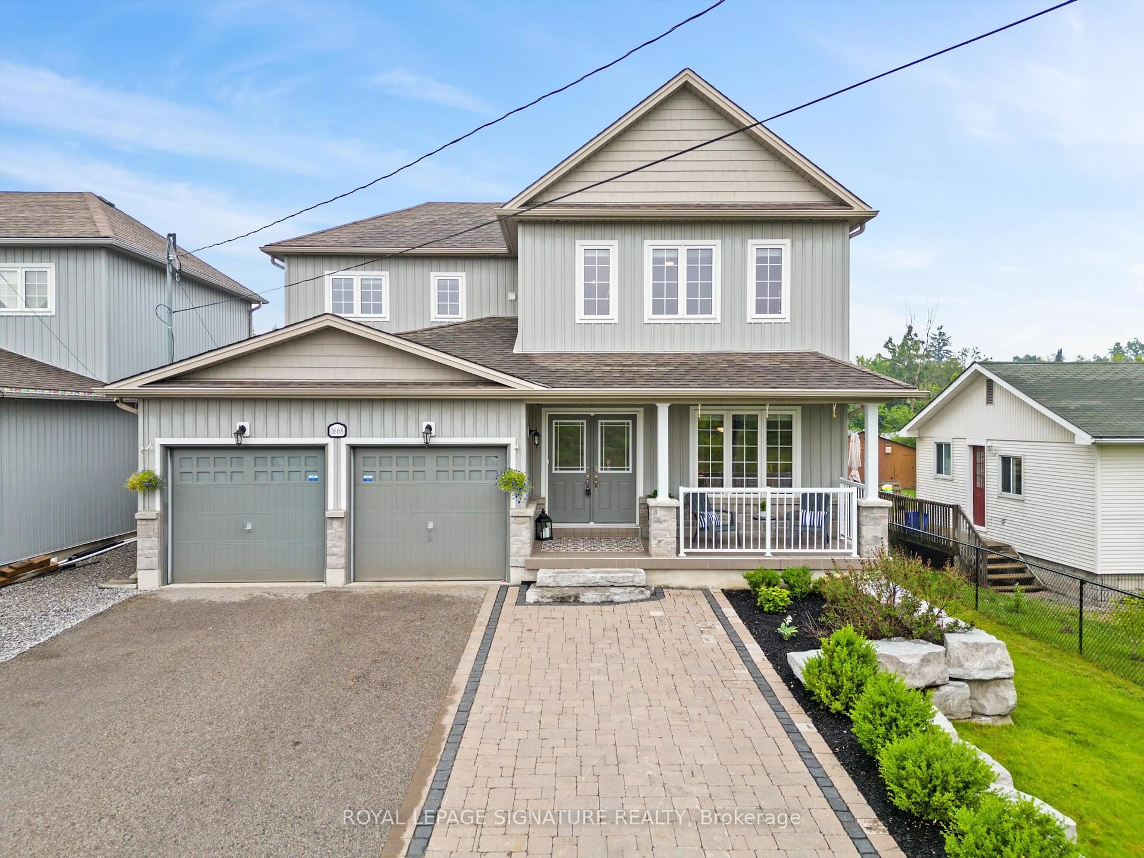 Home with vinyl exterior material, street for 1668 Metro Rd, Georgina Ontario L0E 1S0