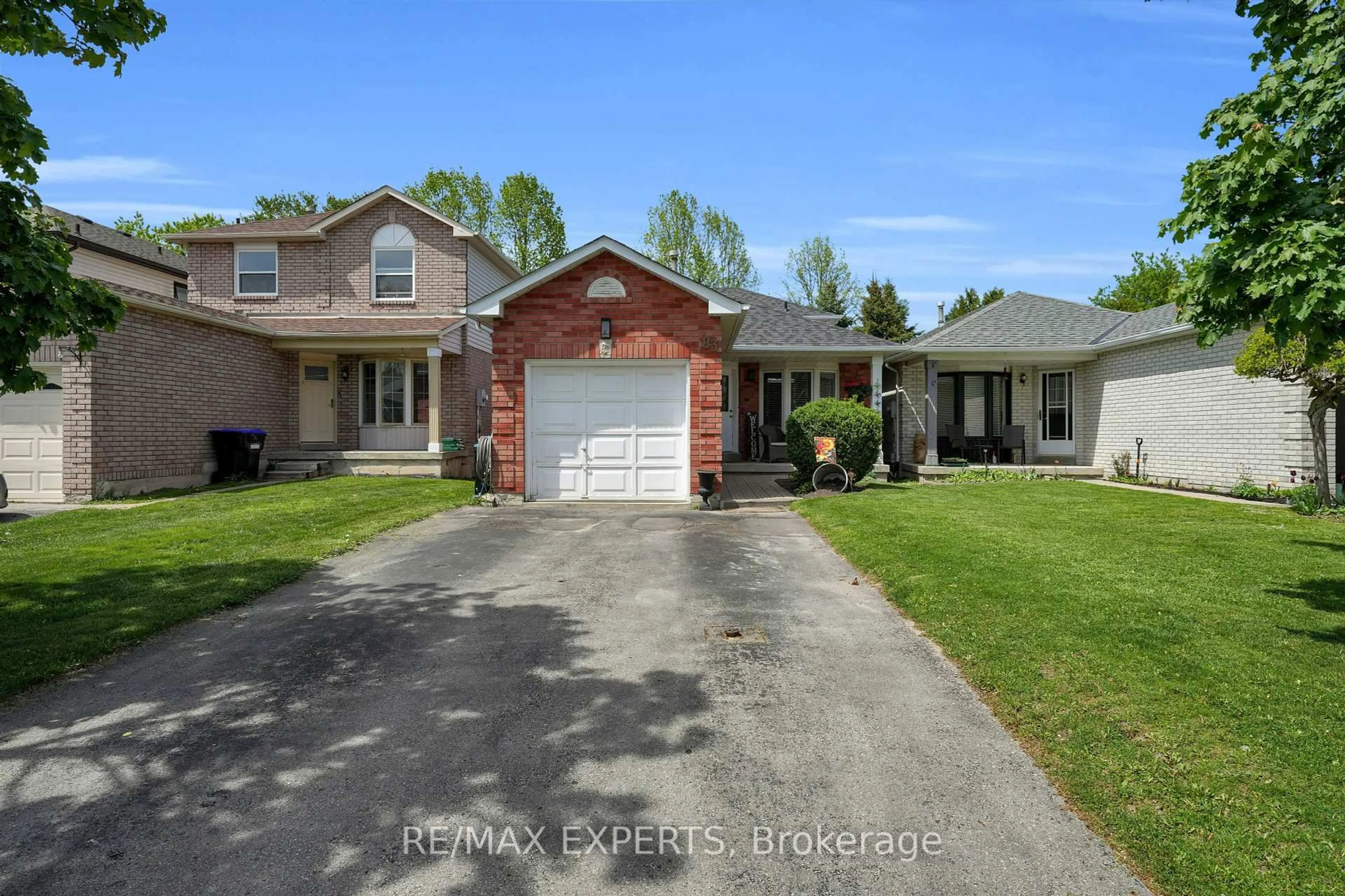 Home with brick exterior material, street for 83 Gray Ave, New Tecumseth Ontario L9R 1P5