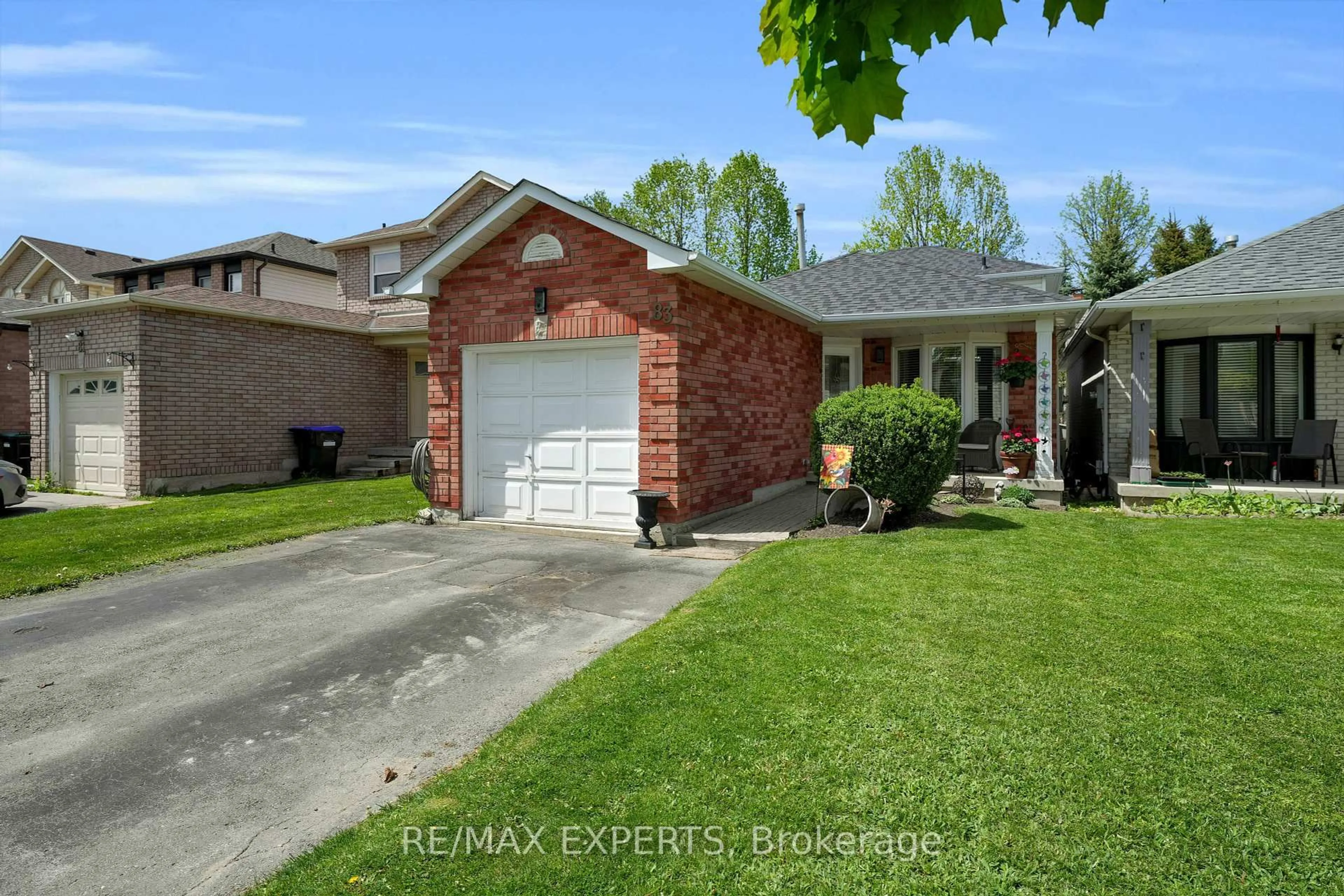 Home with brick exterior material, street for 83 Gray Ave, New Tecumseth Ontario L9R 1P5
