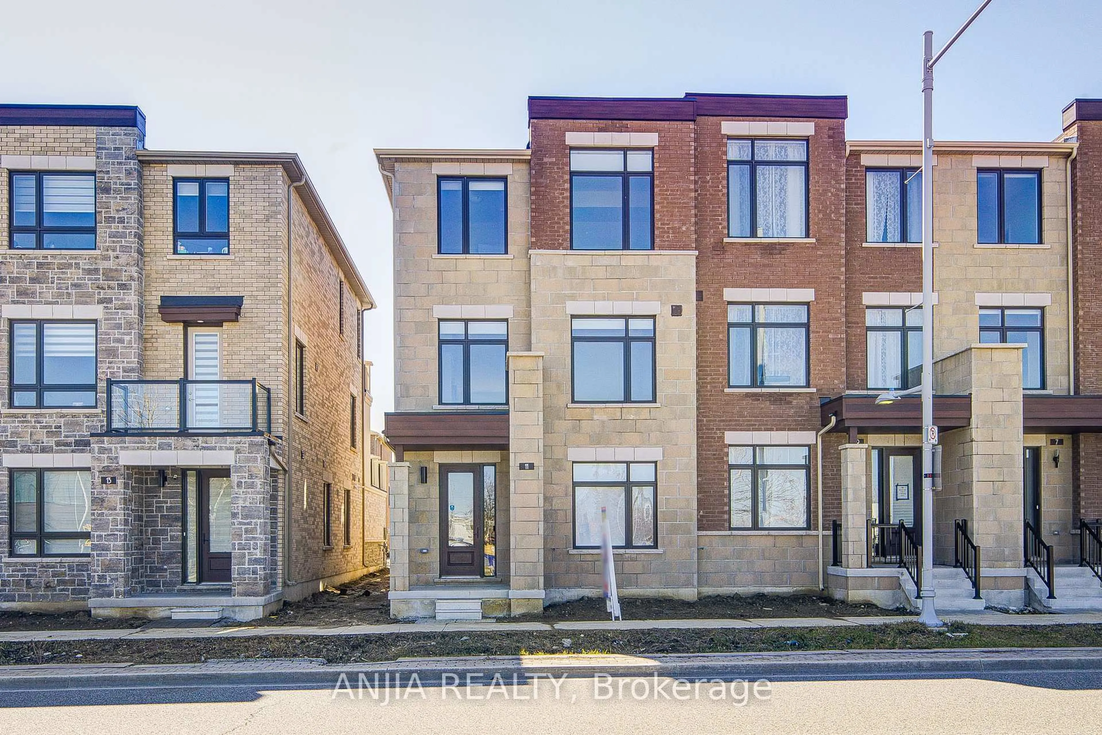 Home with brick exterior material, street for 11 Mumbai Dr, Markham Ontario L3S 0G1