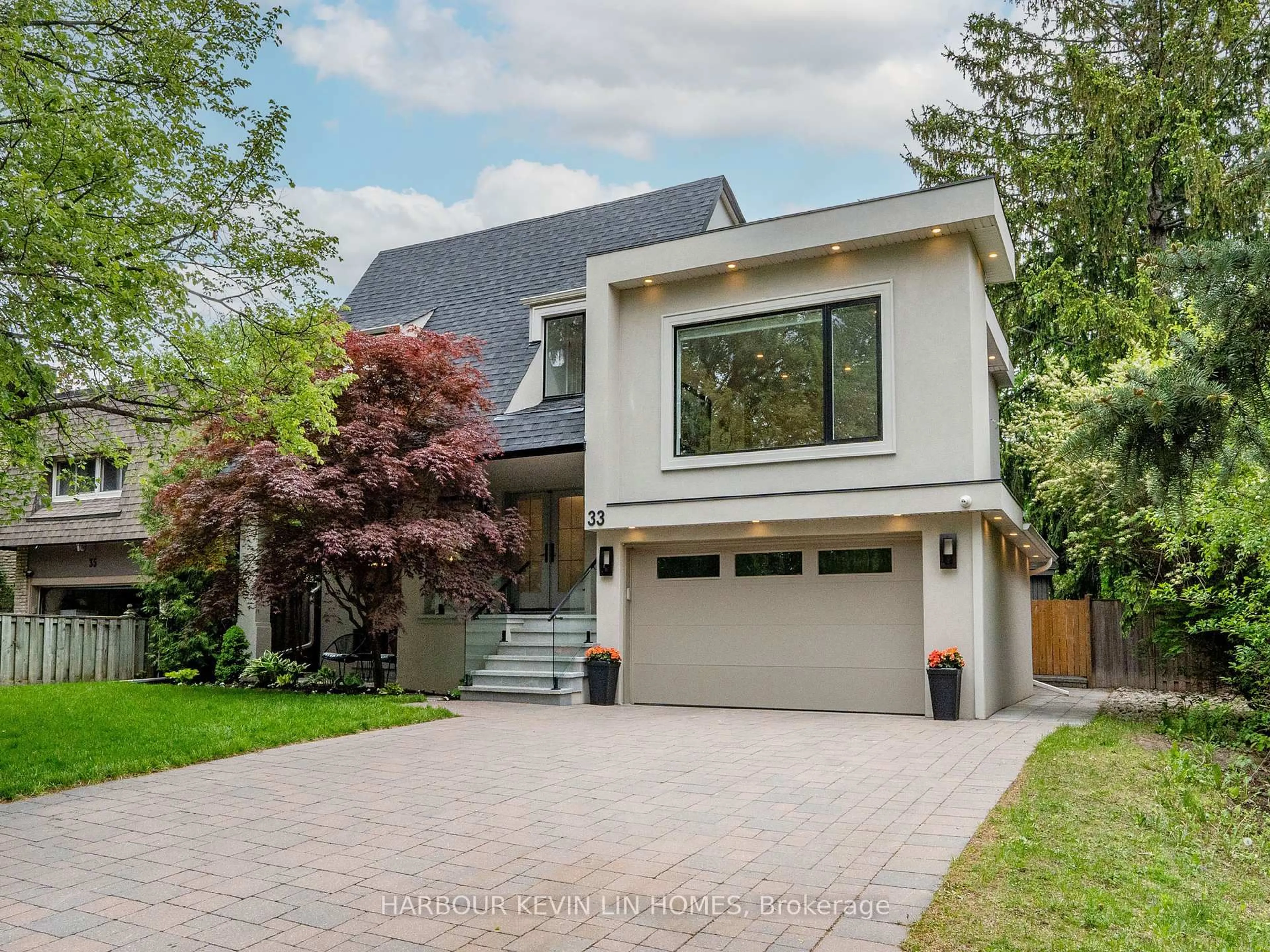Home with brick exterior material, street for 33 Baymark Rd, Markham Ontario L3T 3Y4