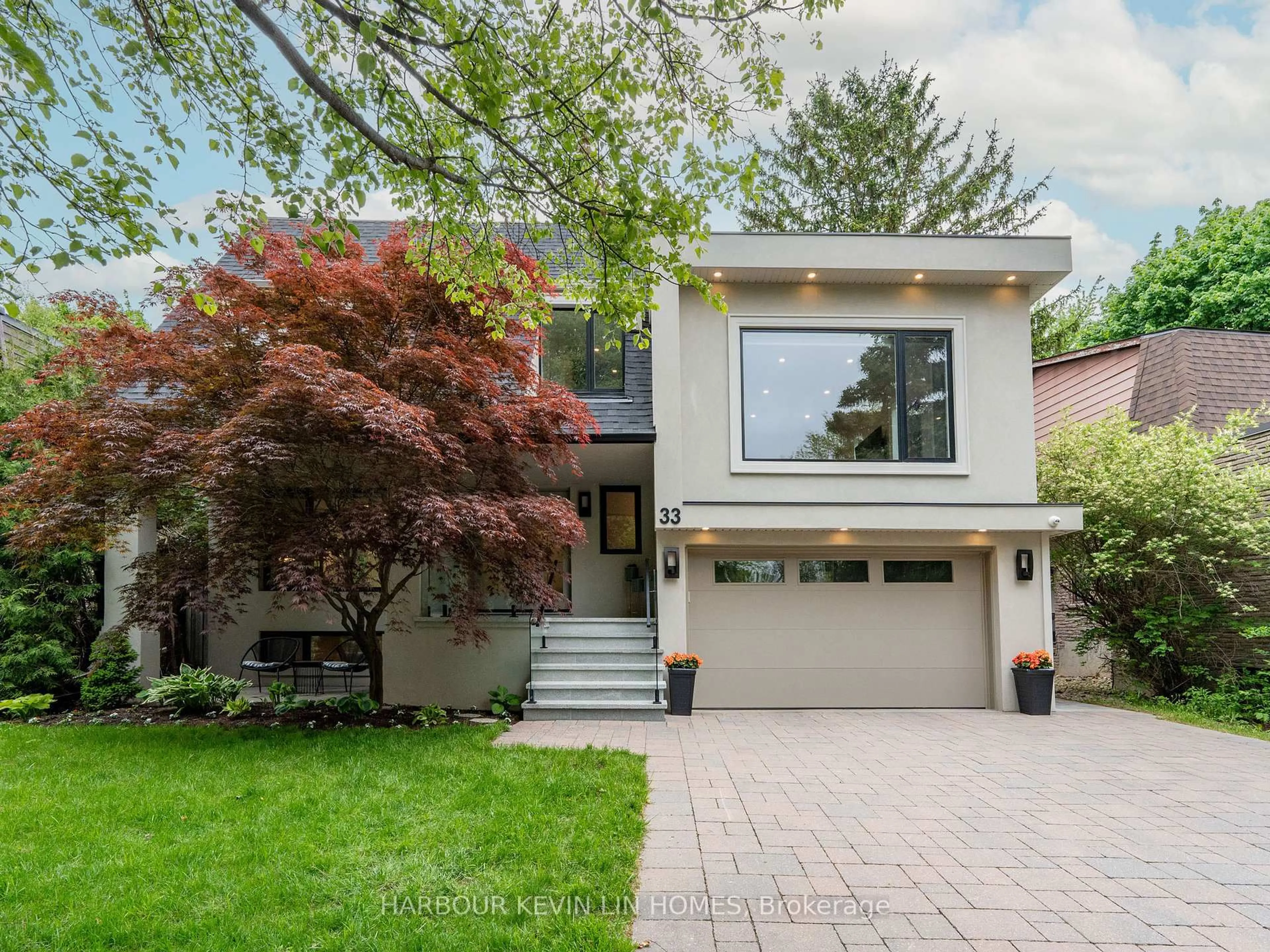 Home with brick exterior material, street for 33 Baymark Rd, Markham Ontario L3T 3Y4