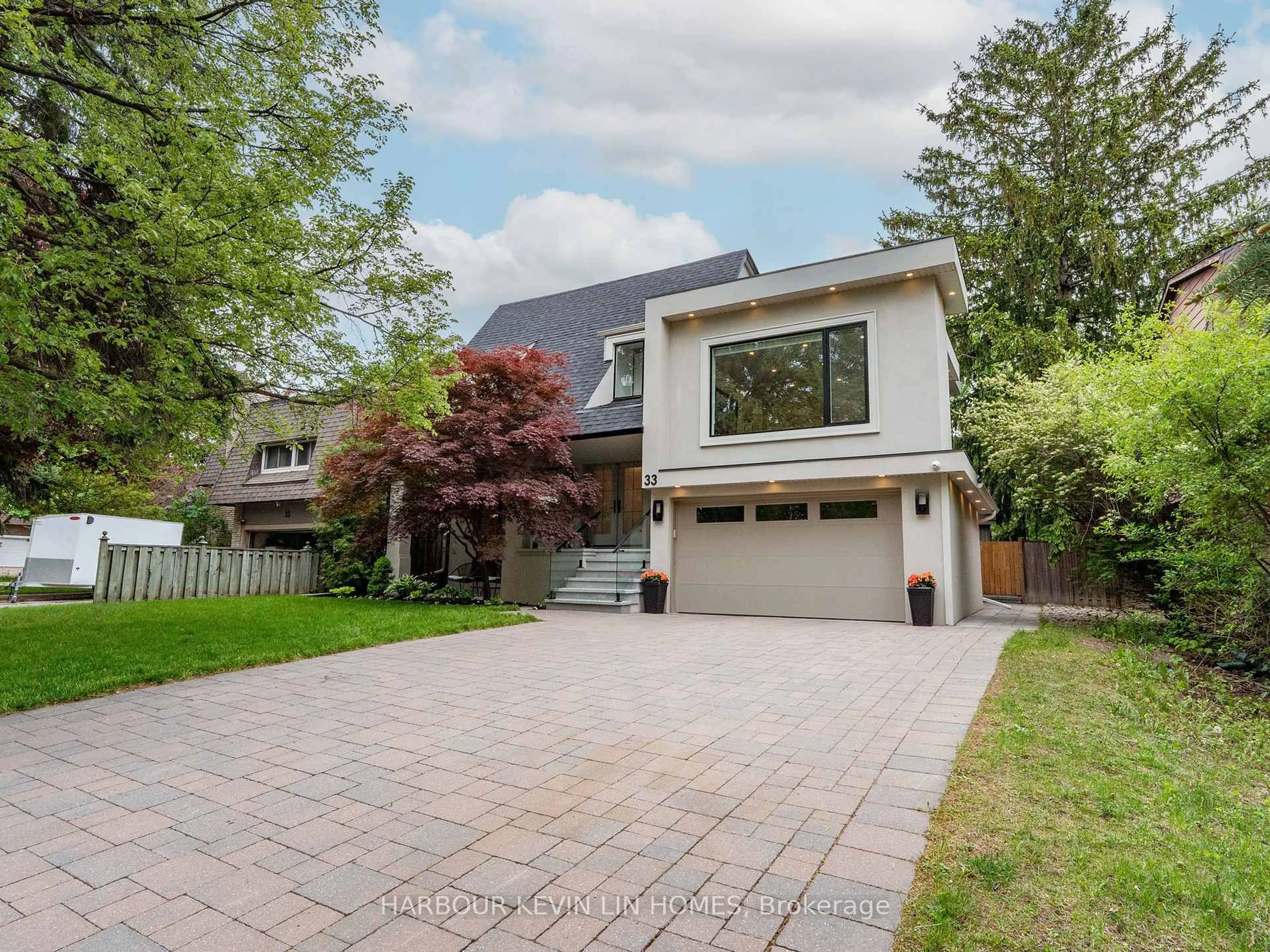 Home with brick exterior material, street for 33 Baymark Rd, Markham Ontario L3T 3Y4
