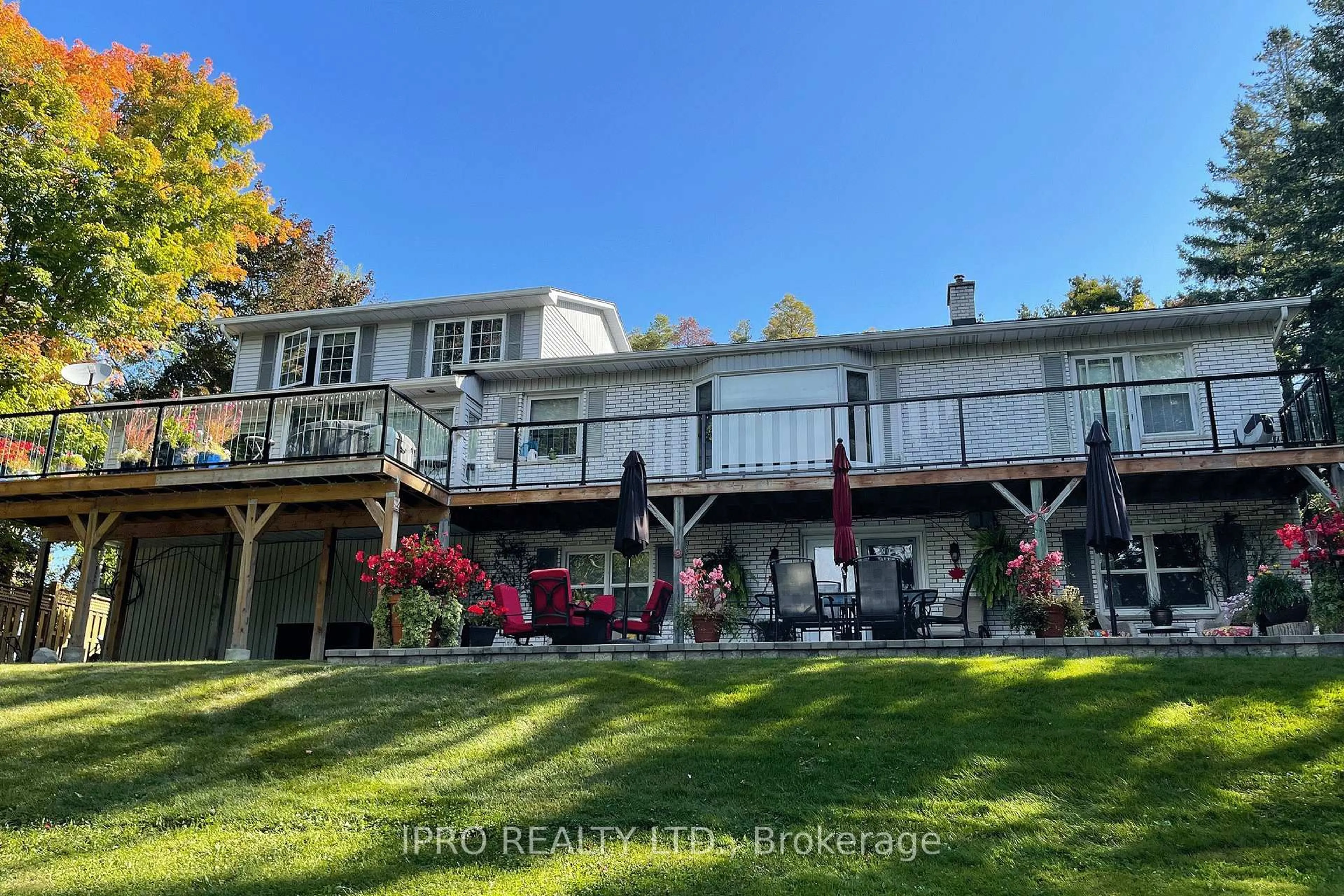 A pic from outside/outdoor area/front of a property/back of a property/a pic from drone, water/lake/river/ocean view for 44 Rodcliff Rd, New Tecumseth Ontario L0G 1W0