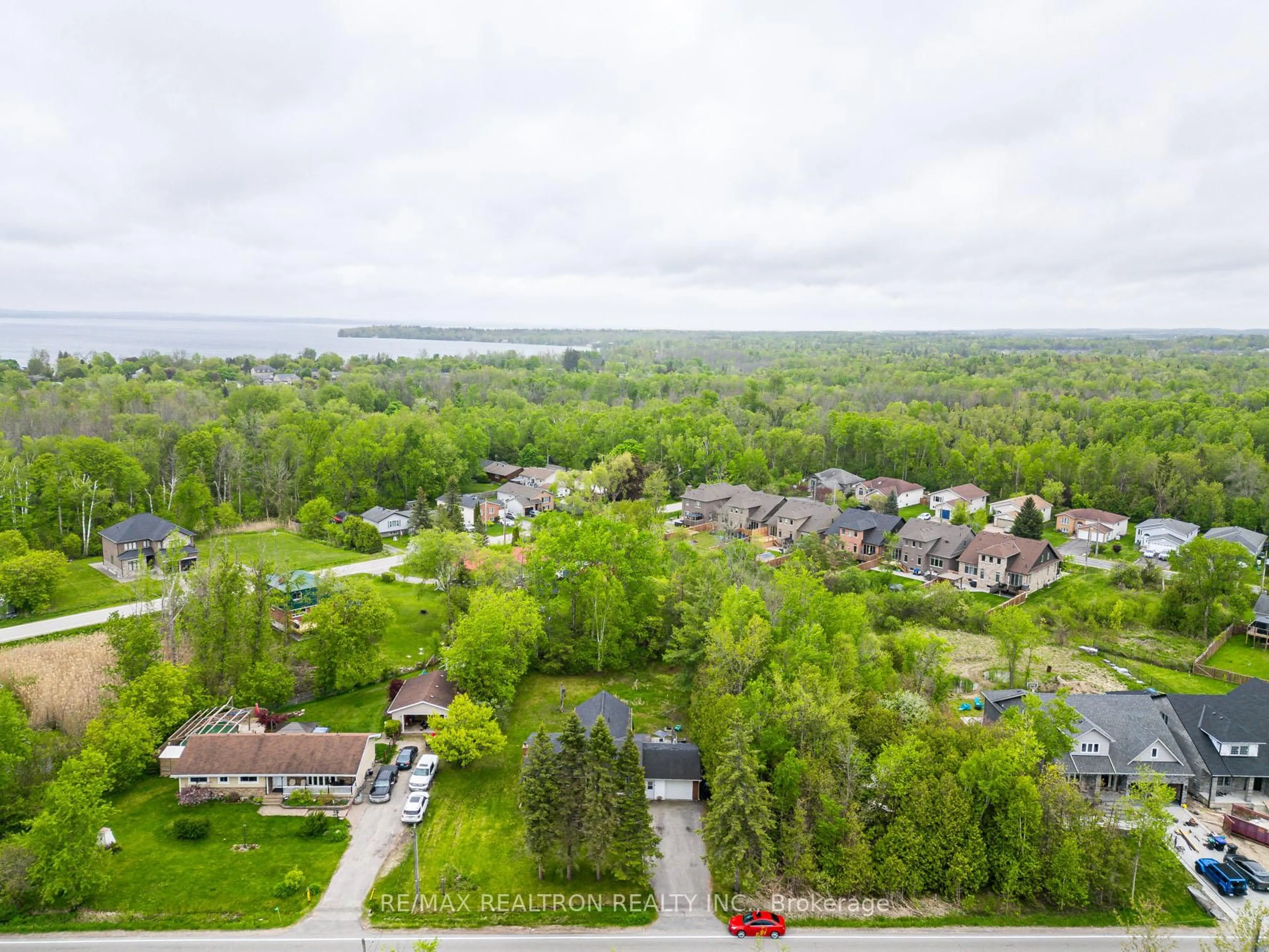 A pic from outside/outdoor area/front of a property/back of a property/a pic from drone, water/lake/river/ocean view for 1147 Belle Aire Beach Rd, Innisfil Ontario L0L 1C0