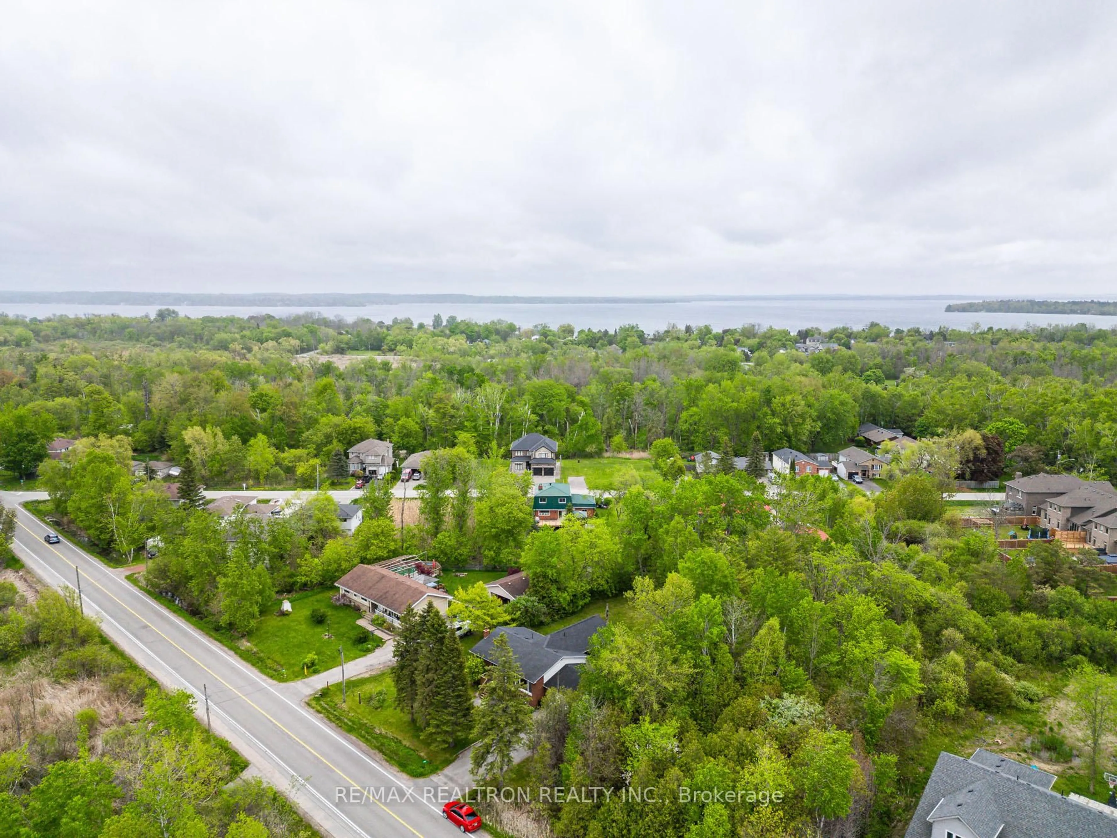 A pic from outside/outdoor area/front of a property/back of a property/a pic from drone, water/lake/river/ocean view for 1147 Belle Aire Beach Rd, Innisfil Ontario L0L 1C0