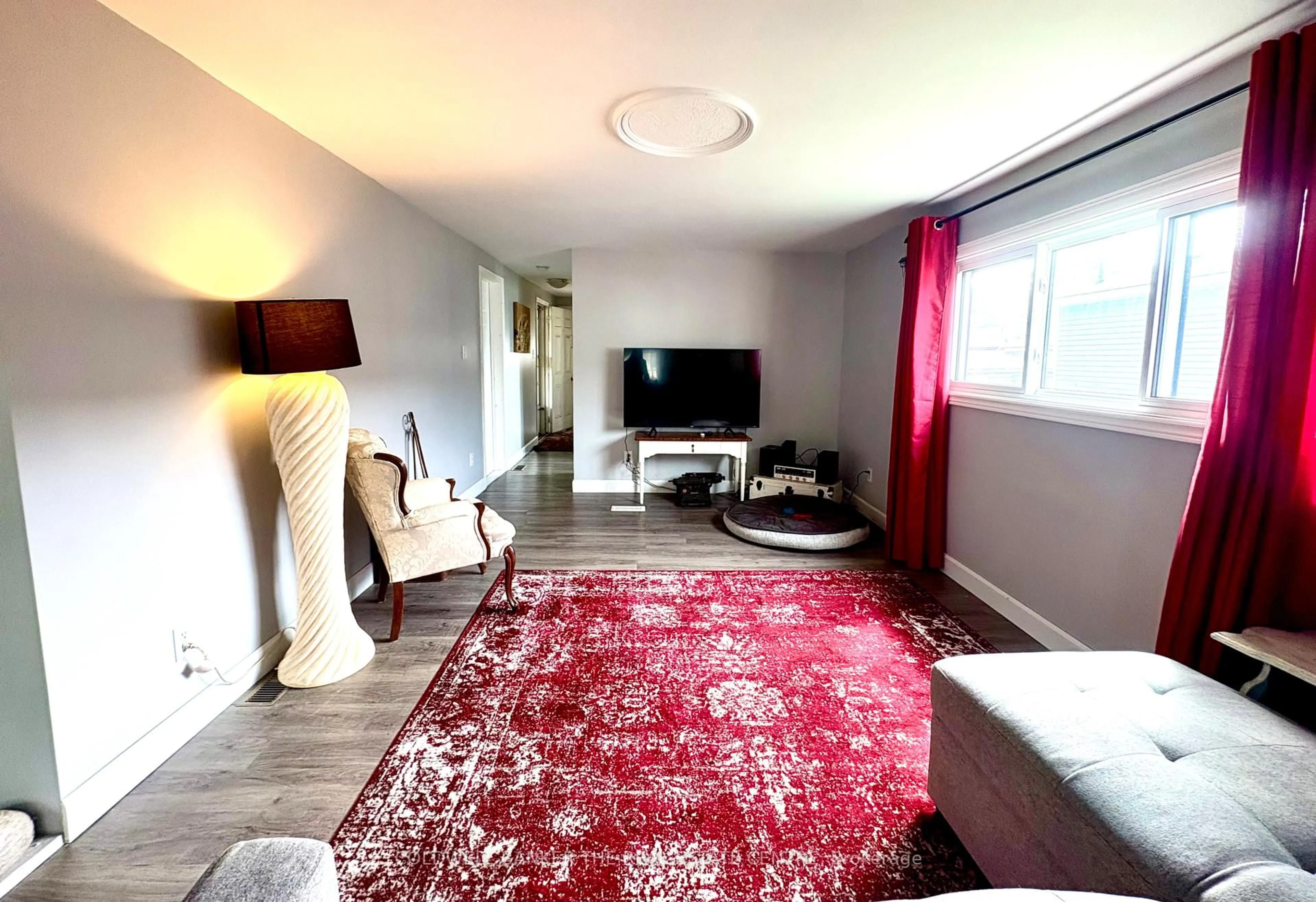 Living room with furniture, unknown for 82 Seventh St, Essa Ontario L3W 0L4