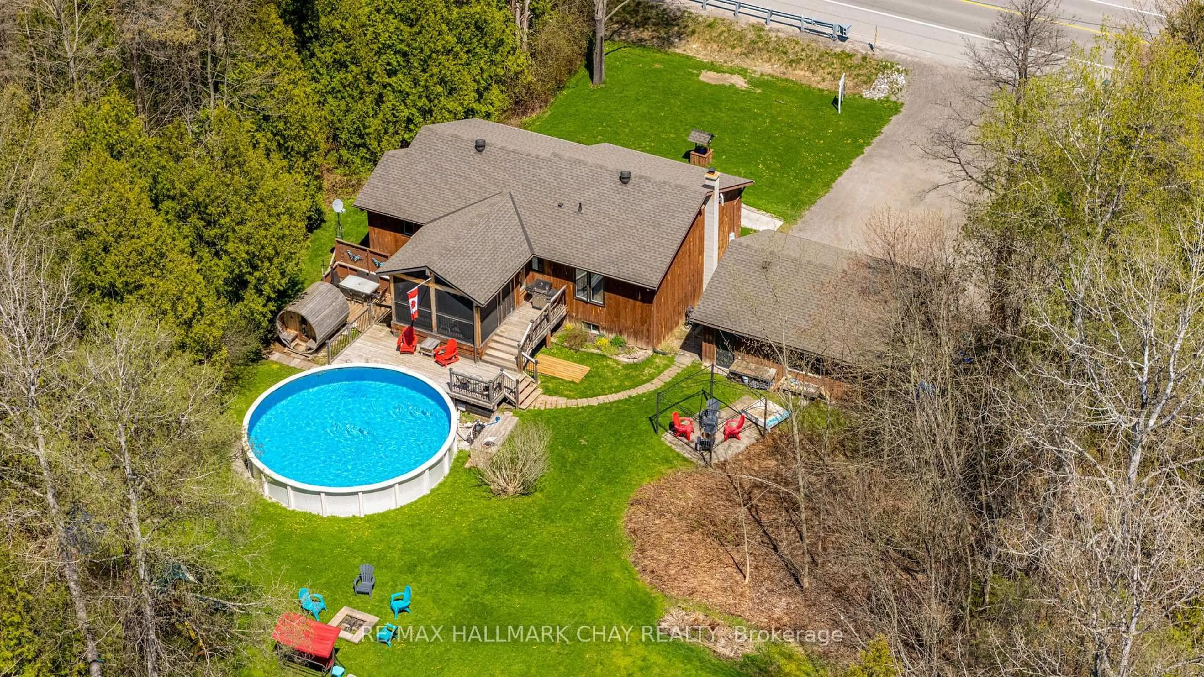 A pic from outside/outdoor area/front of a property/back of a property/a pic from drone, water/lake/river/ocean view for 7912 County Road 56 Rd, Essa Ontario L0M 1T0
