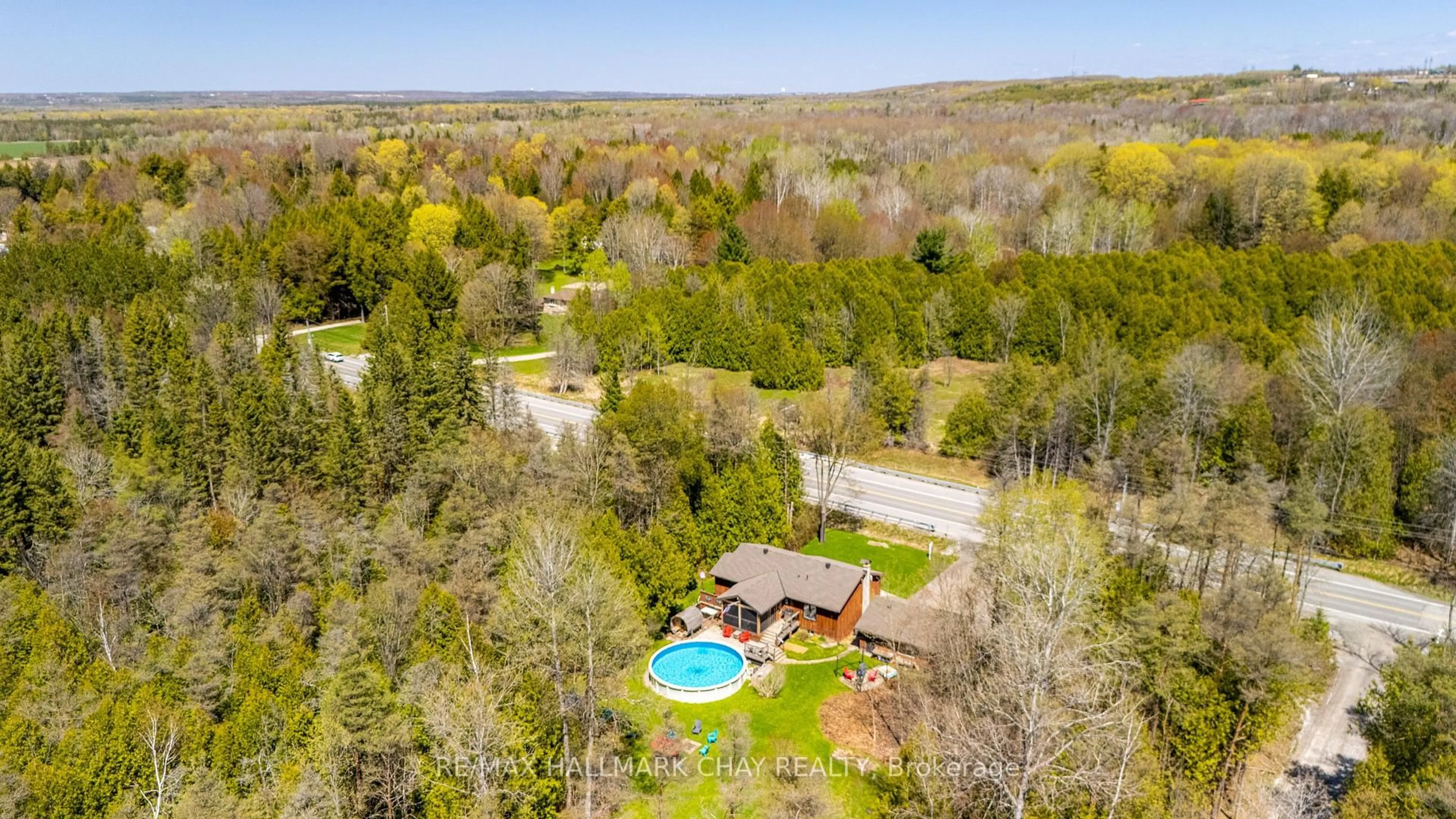 A pic from outside/outdoor area/front of a property/back of a property/a pic from drone, water/lake/river/ocean view for 7912 County Road 56 Rd, Essa Ontario L0M 1T0