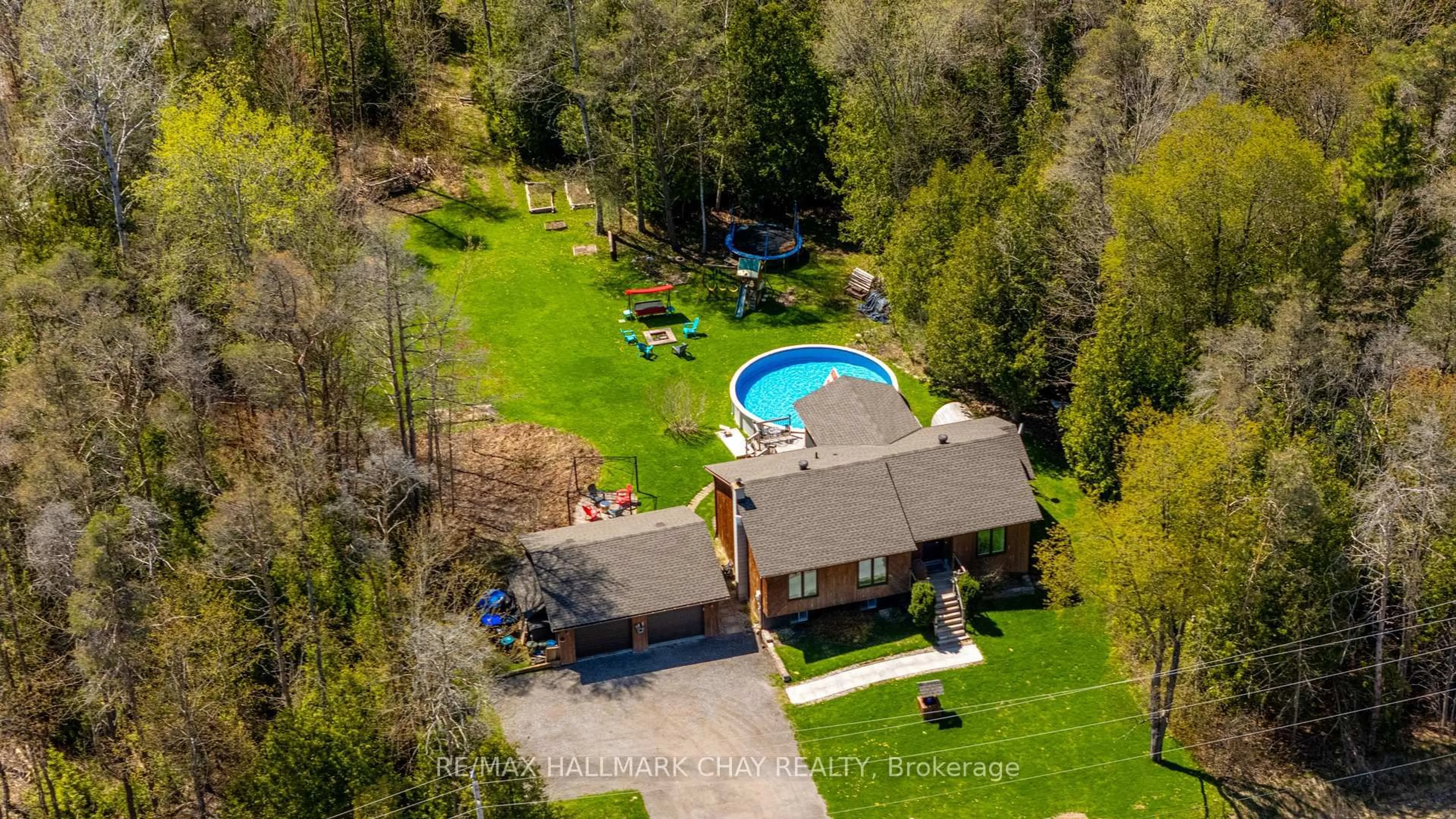 A pic from outside/outdoor area/front of a property/back of a property/a pic from drone, water/lake/river/ocean view for 7912 County Road 56 Rd, Essa Ontario L0M 1T0