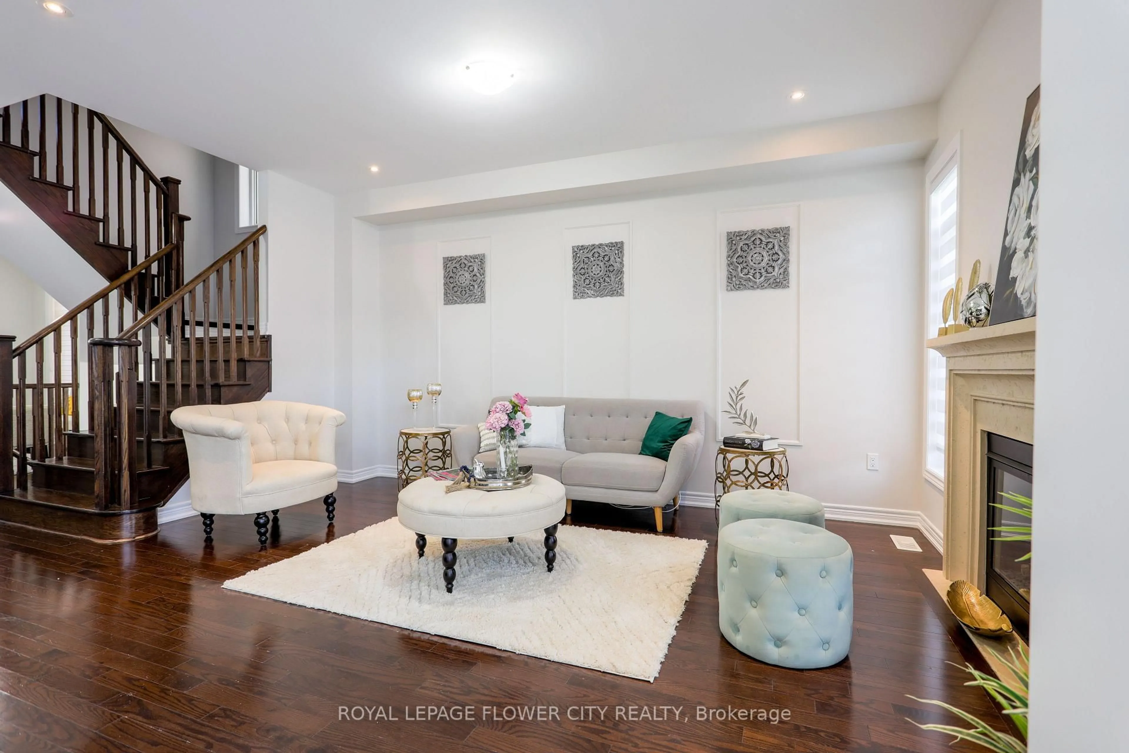 Living room with furniture, wood/laminate floor for 68 Killington Ave, Vaughan Ontario L4H 3N5