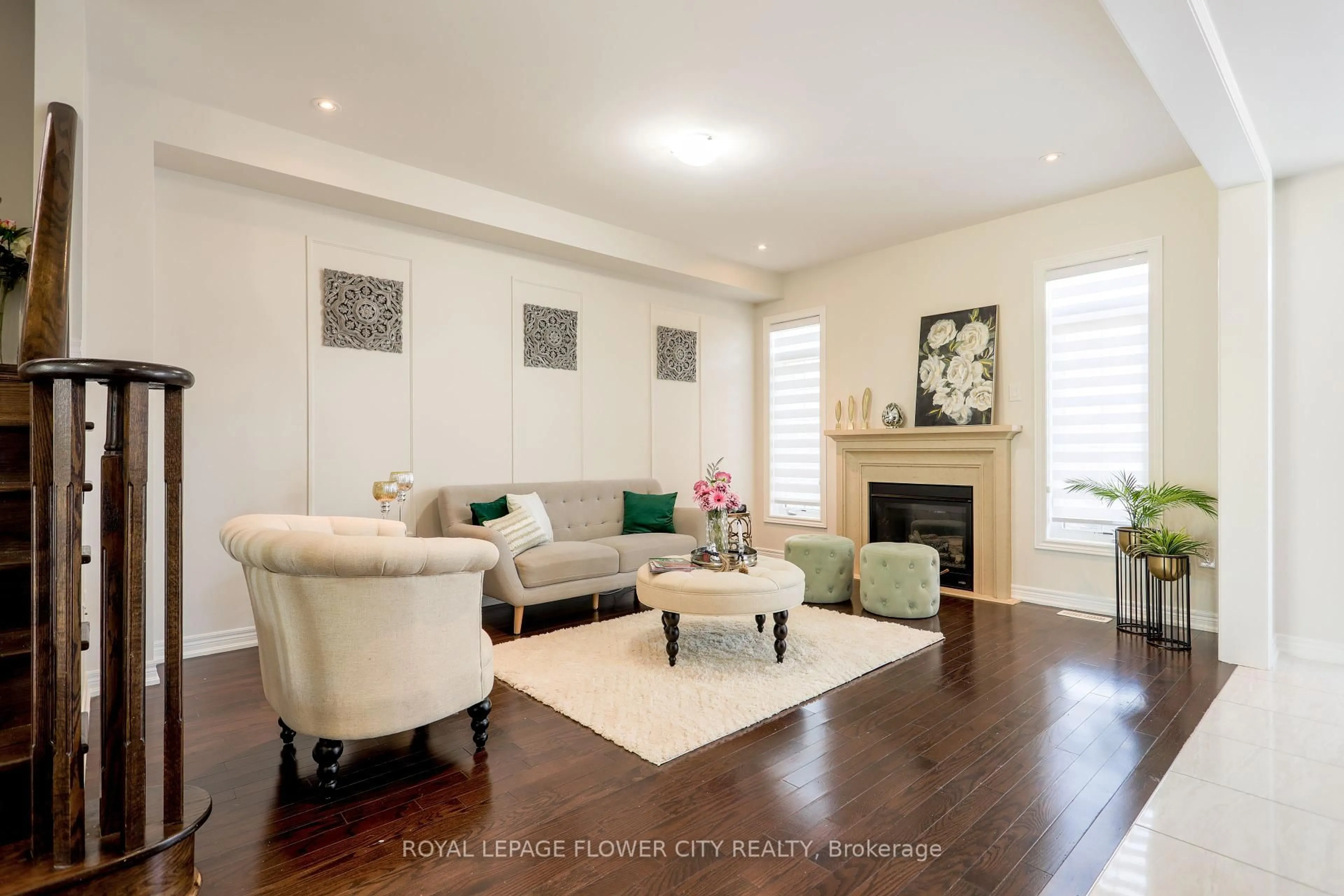 Living room with furniture, wood/laminate floor for 68 Killington Ave, Vaughan Ontario L4H 3N5