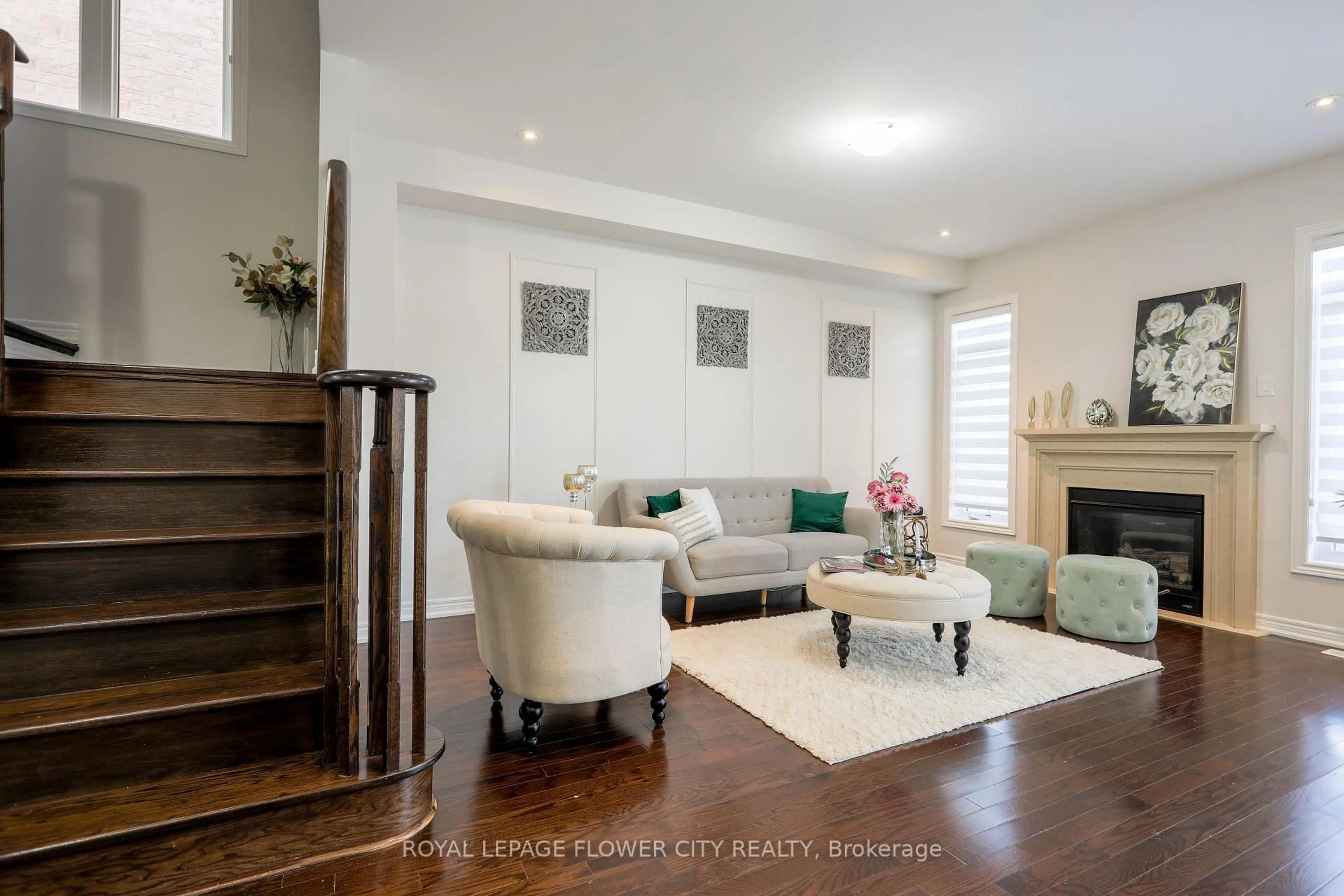 Living room with furniture, wood/laminate floor for 68 Killington Ave, Vaughan Ontario L4H 3N5