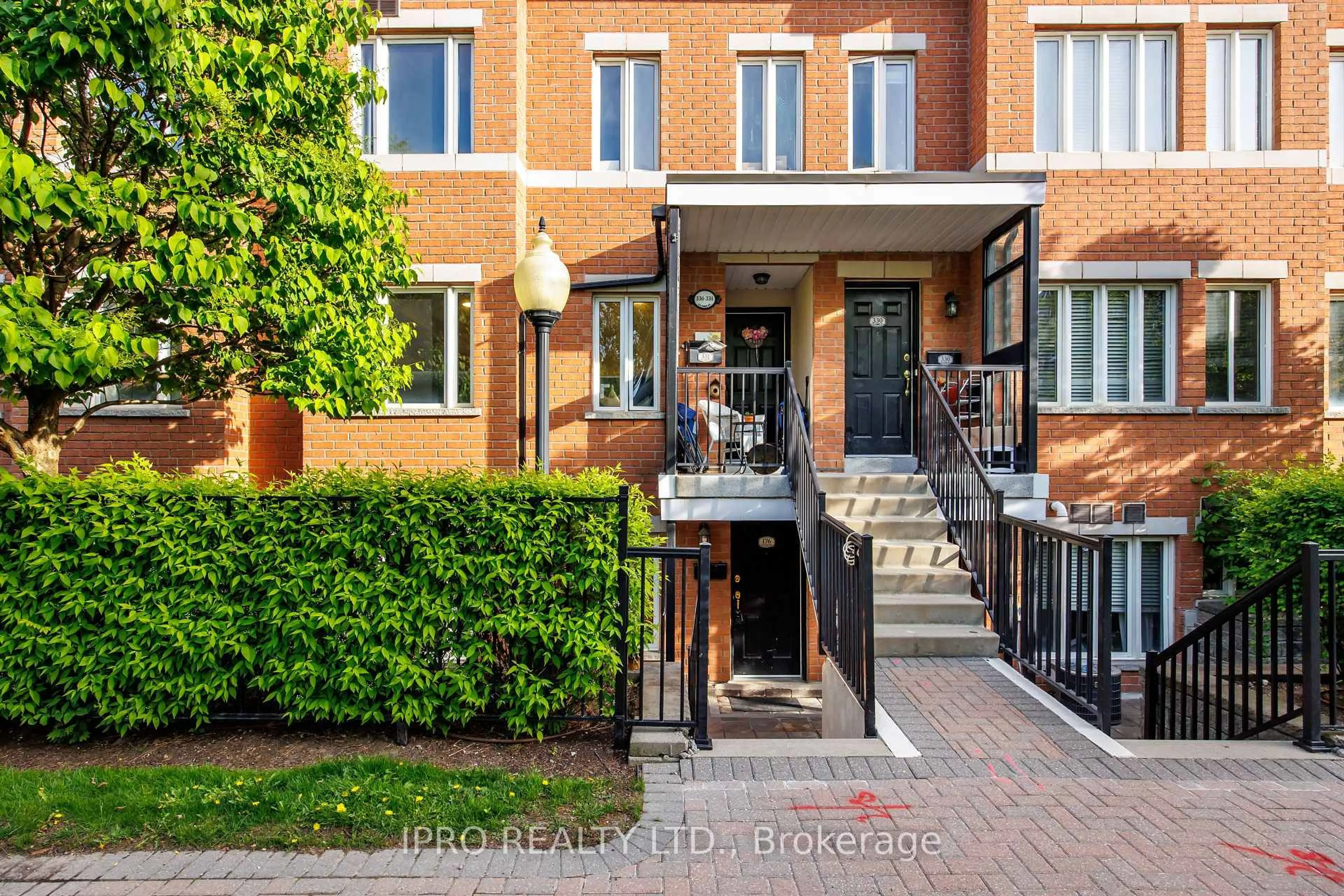 Home with brick exterior material, street for 312 John St #176, Markham Ontario L3T 0A7
