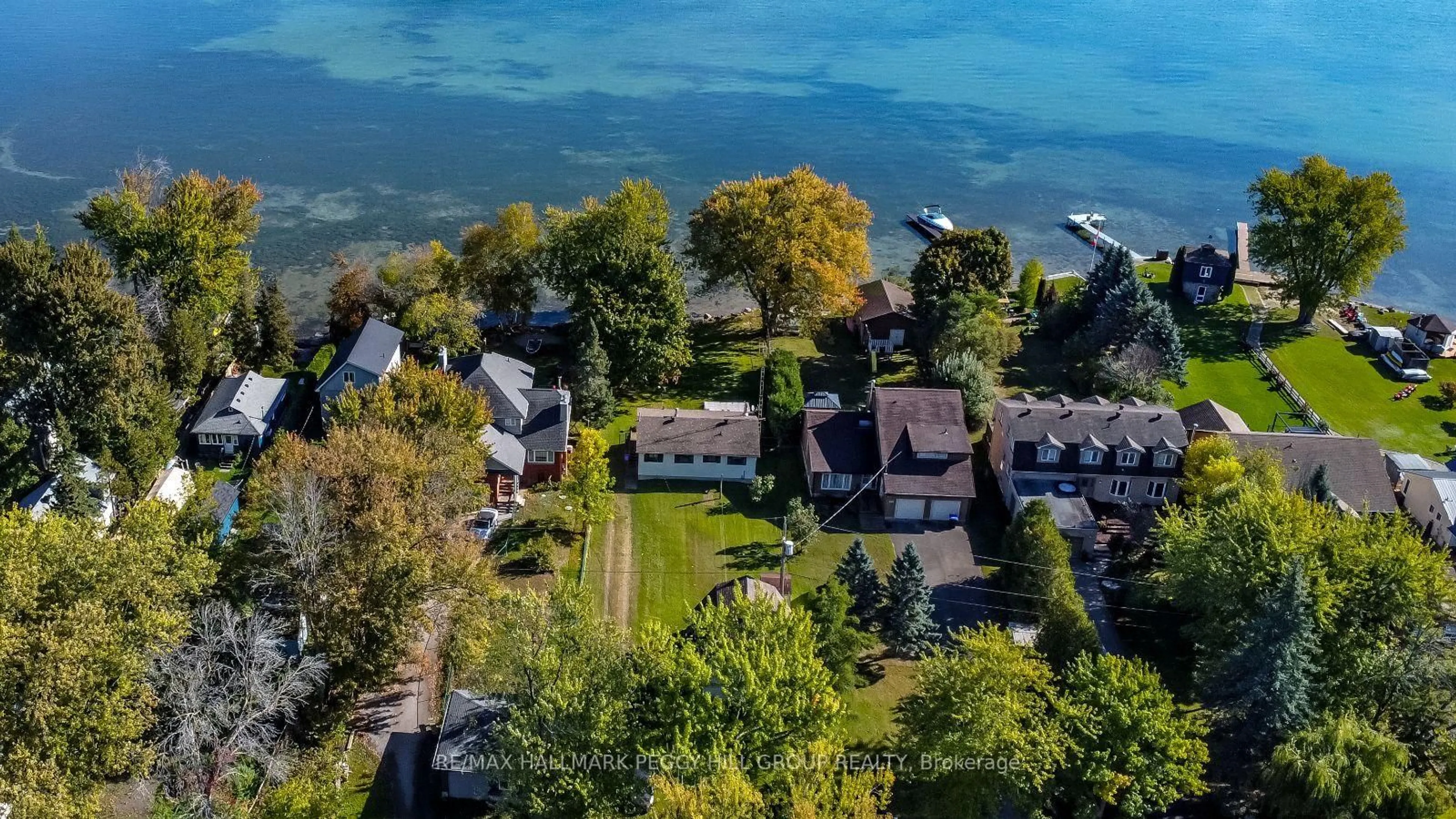 A pic from outside/outdoor area/front of a property/back of a property/a pic from drone, water/lake/river/ocean view for 253 Bayshore Rd, Innisfil Ontario L0L 1K0