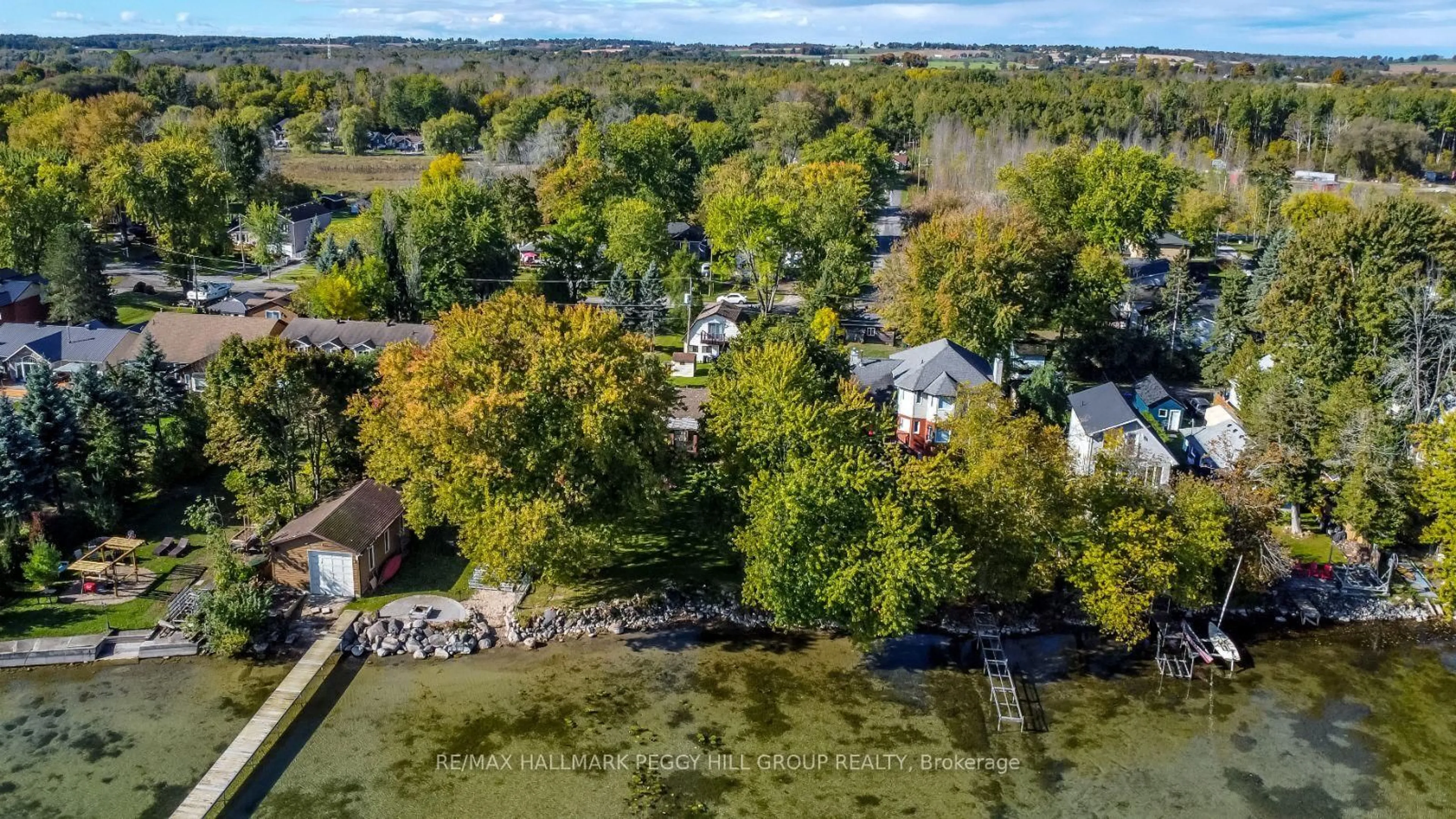 A pic from outside/outdoor area/front of a property/back of a property/a pic from drone, water/lake/river/ocean view for 253 Bayshore Rd, Innisfil Ontario L0L 1K0