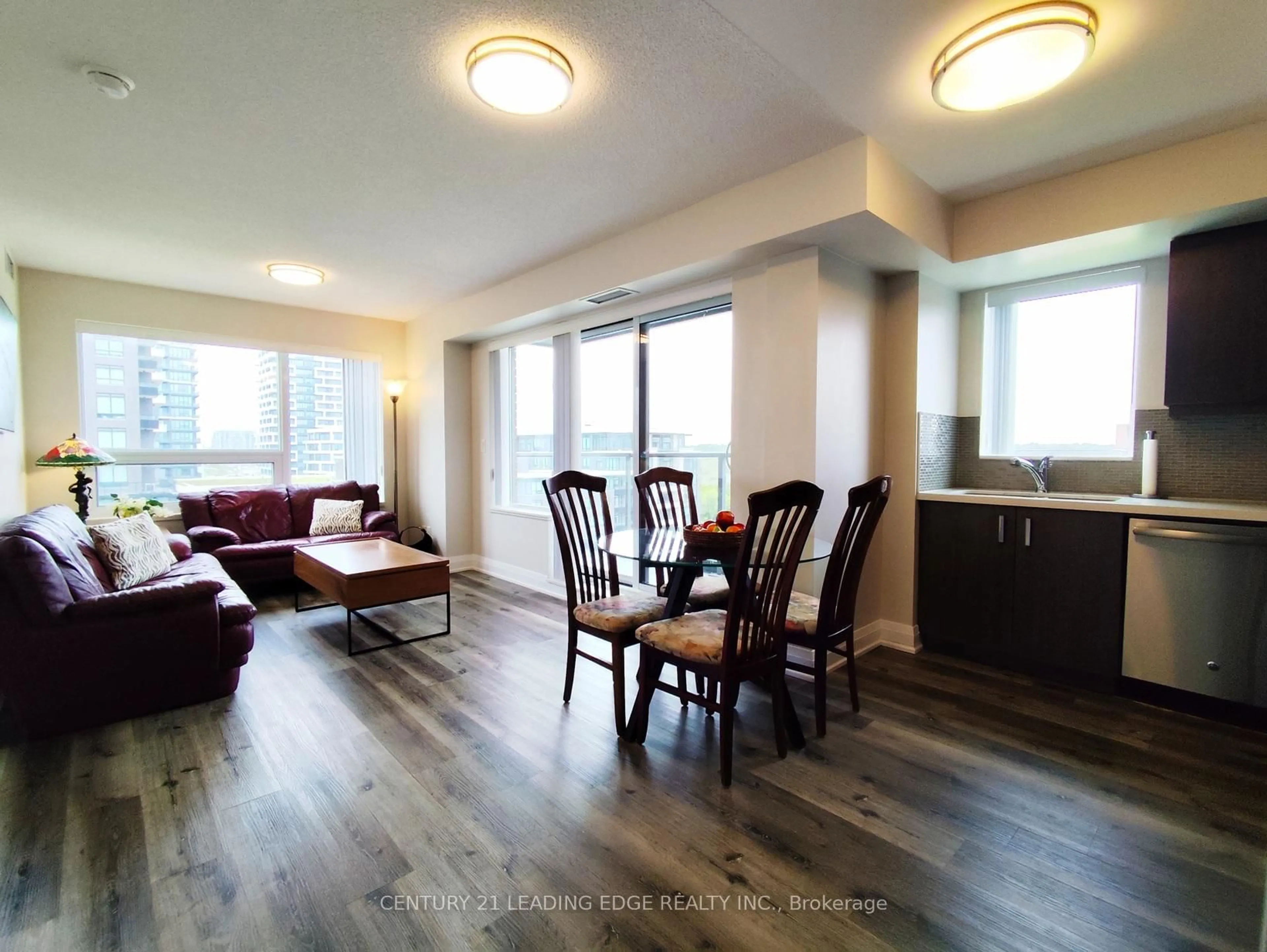 Living room with furniture, wood/laminate floor for 18 Uptown Dr #1010, Markham Ontario L3R 5M5