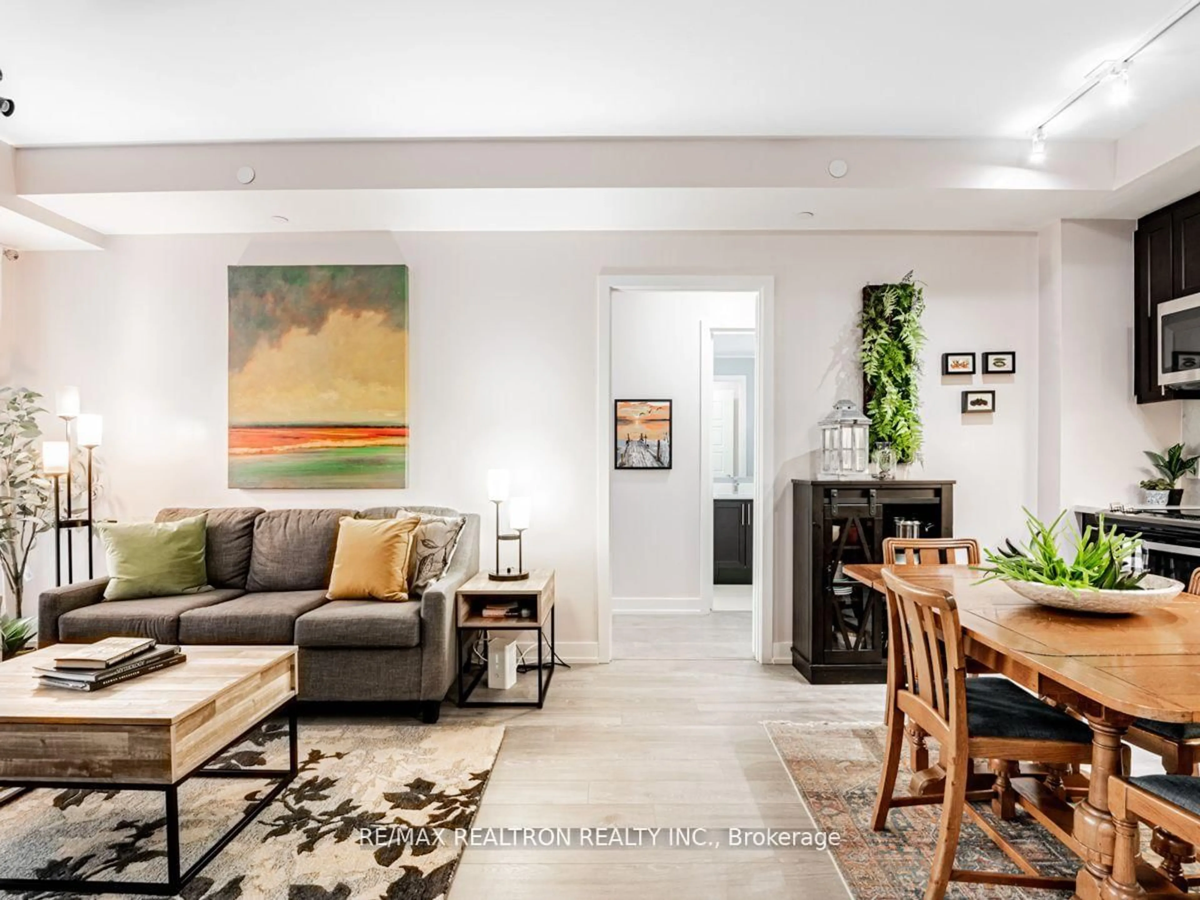 Living room with furniture, unknown for 301 Sea Ray Ave #C305, Innisfil Ontario L9S 0L8