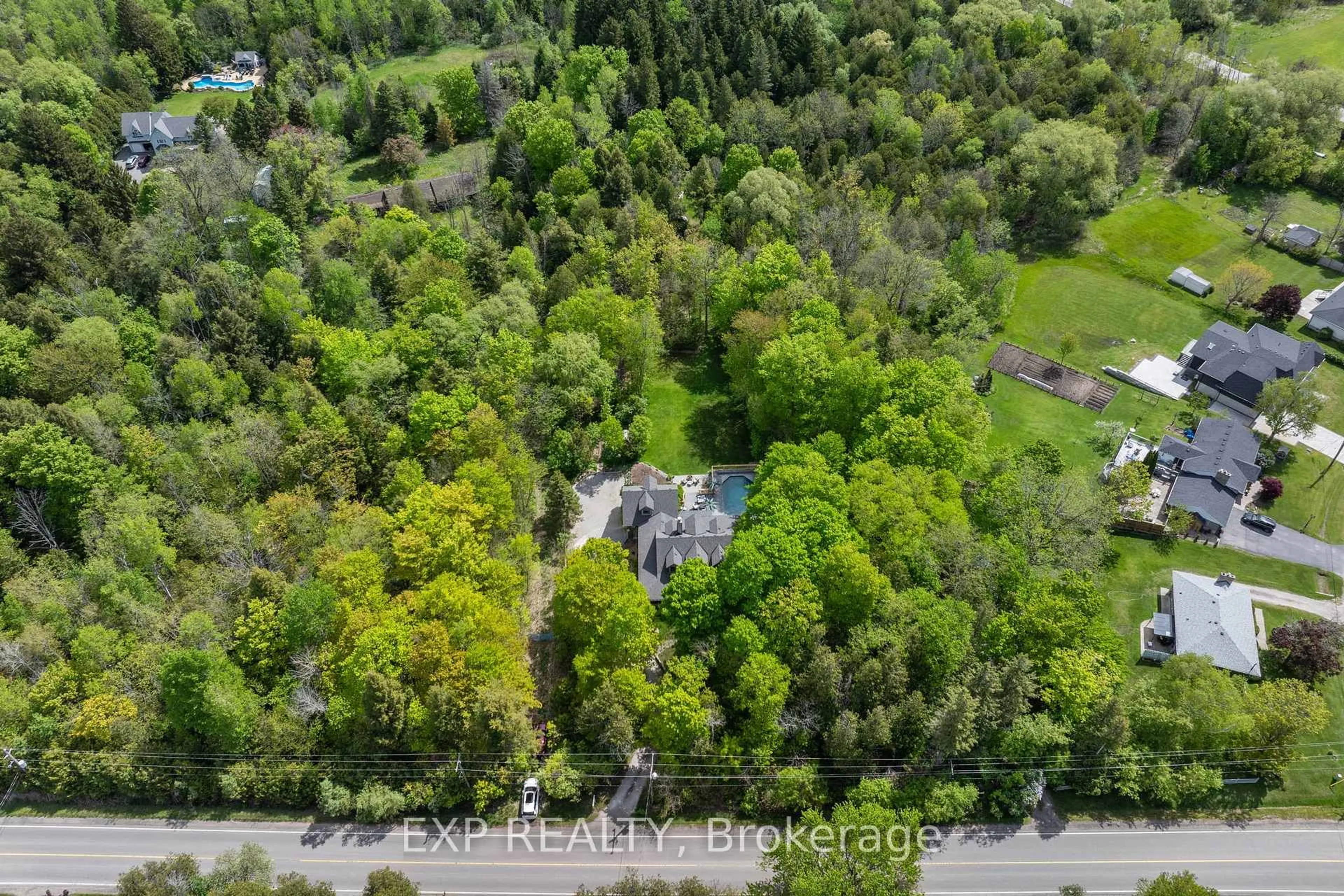 A pic from outside/outdoor area/front of a property/back of a property/a pic from drone, forest/trees view for 16171 7th Concession N/A, King Ontario L7B 0E1