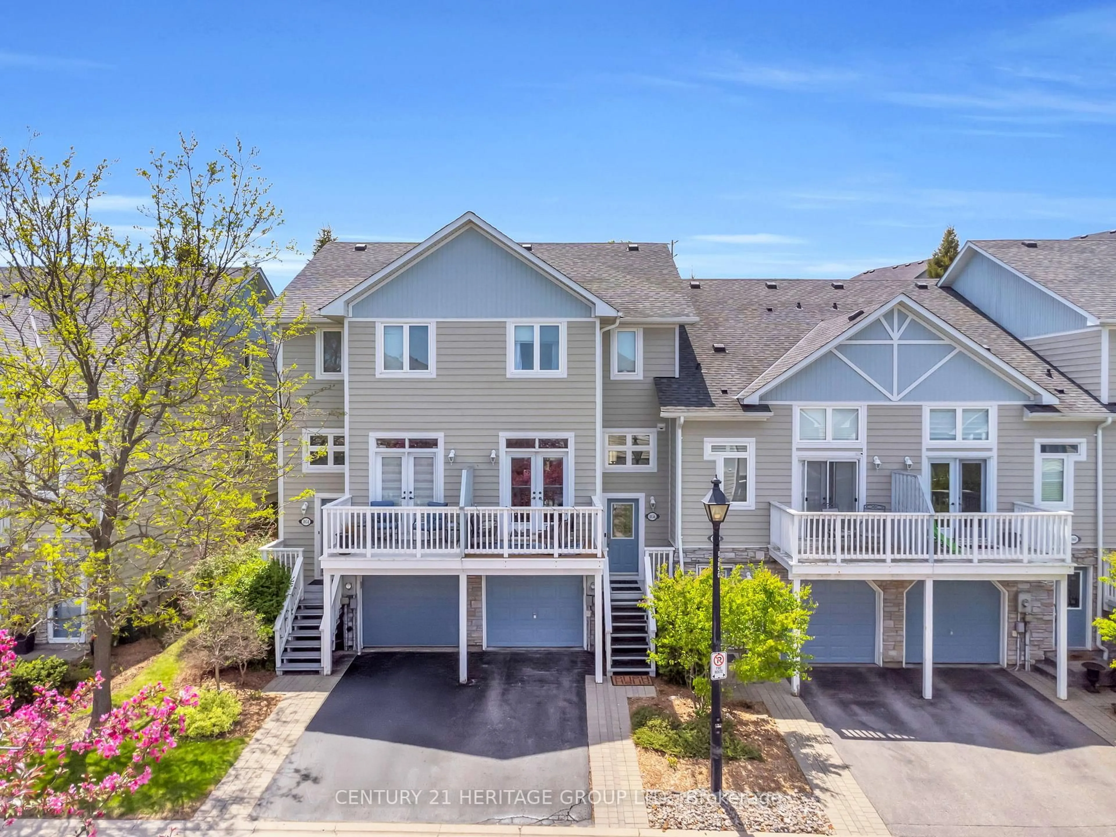 A pic from outside/outdoor area/front of a property/back of a property/a pic from drone, water/lake/river/ocean view for 1056 On Bogart Circ #66, Newmarket Ontario L3Y 8T4