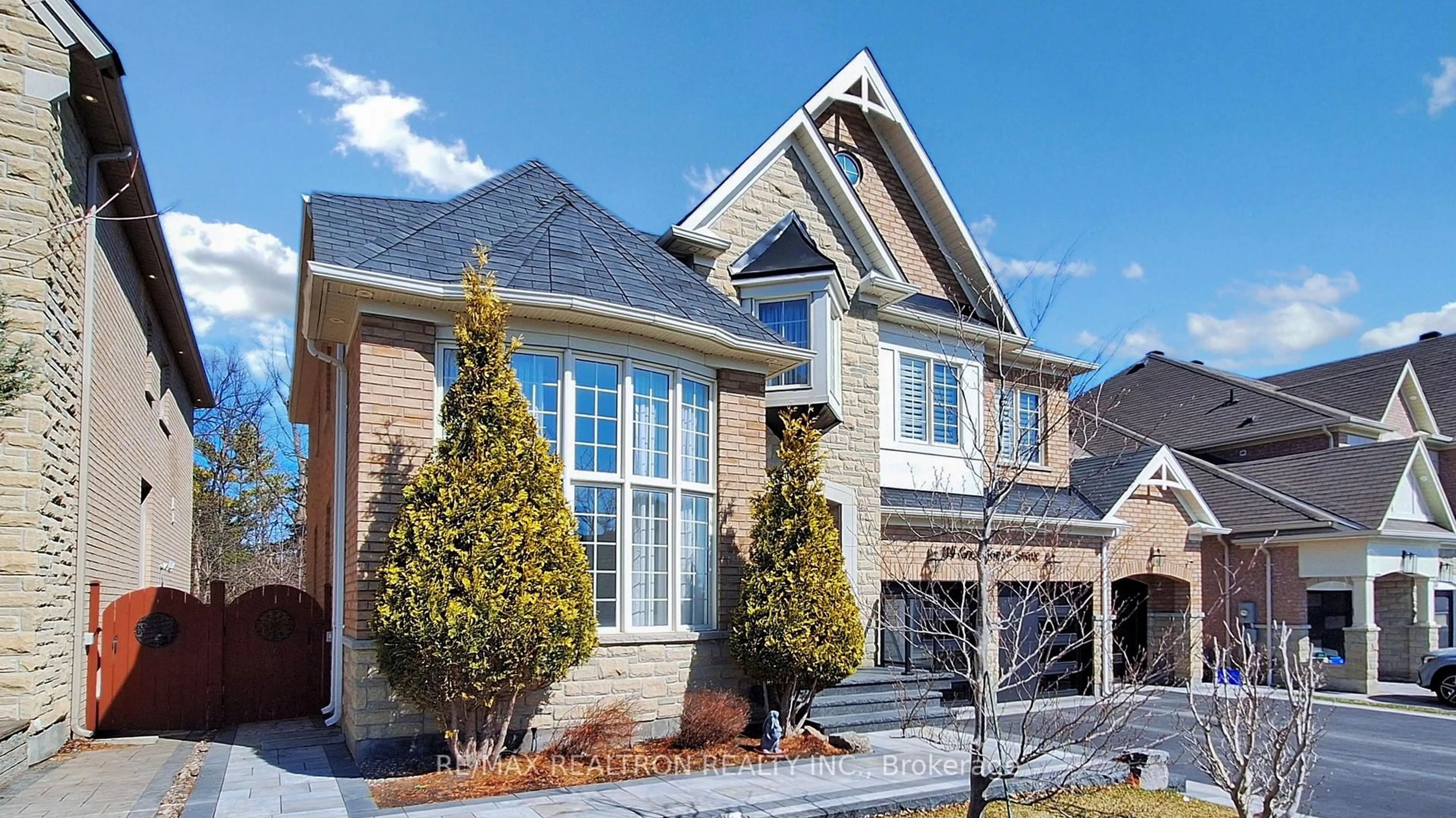 Home with brick exterior material, street for 114 Greenforest Grve, Whitchurch-Stouffville Ontario L4A 1S7