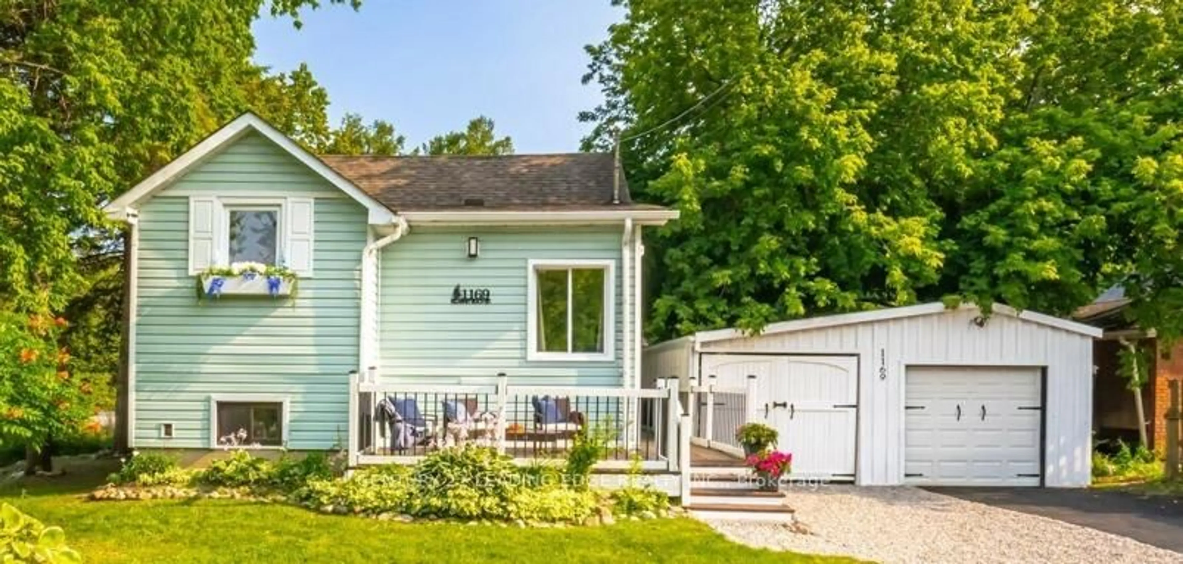 Home with vinyl exterior material, street for 1169 Killarney Beach Rd, Innisfil Ontario L0L 1W0