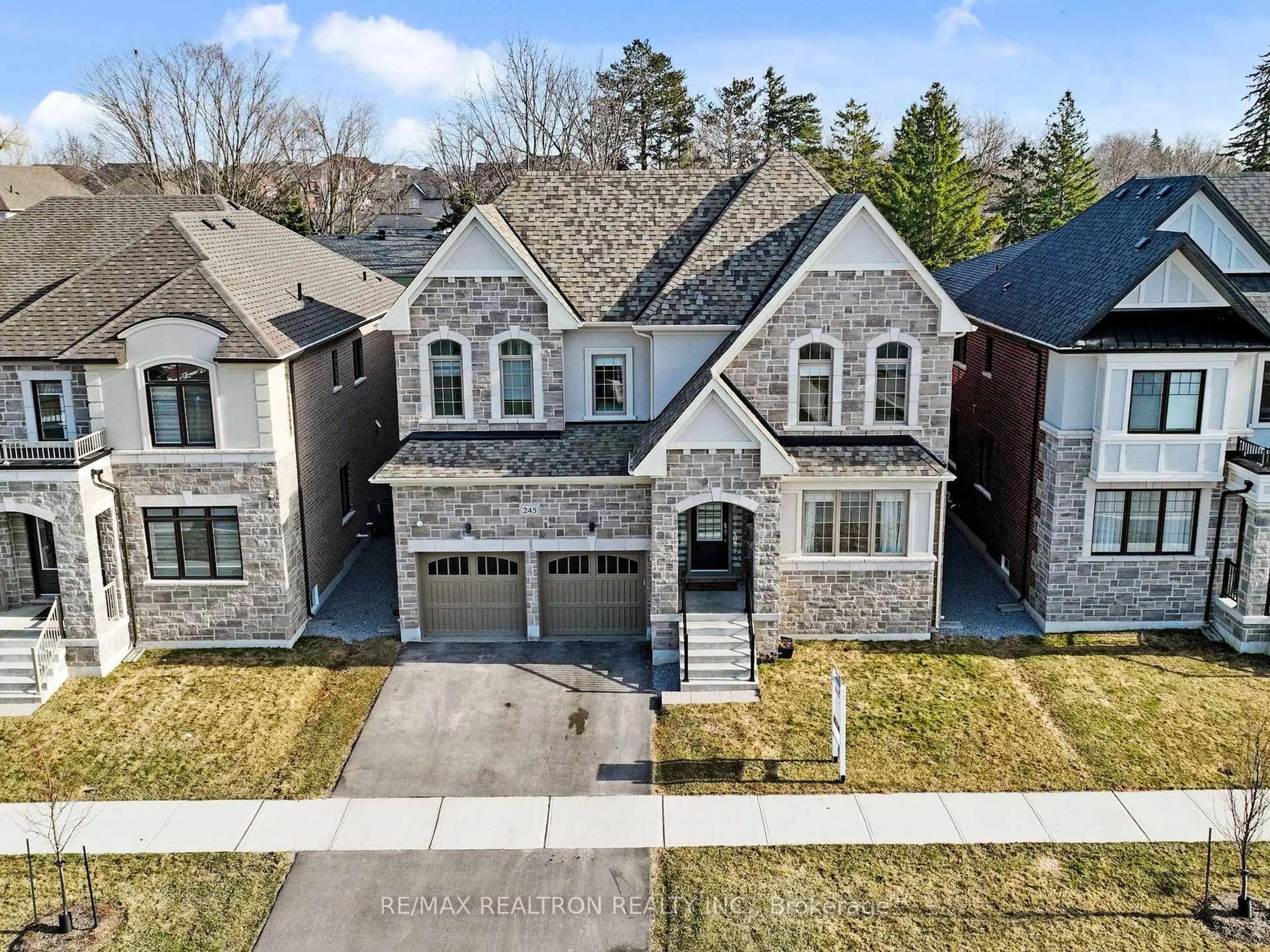 Home with brick exterior material, street for 245 Danny Wheeler Blvd, Georgina Ontario L4P 0J8