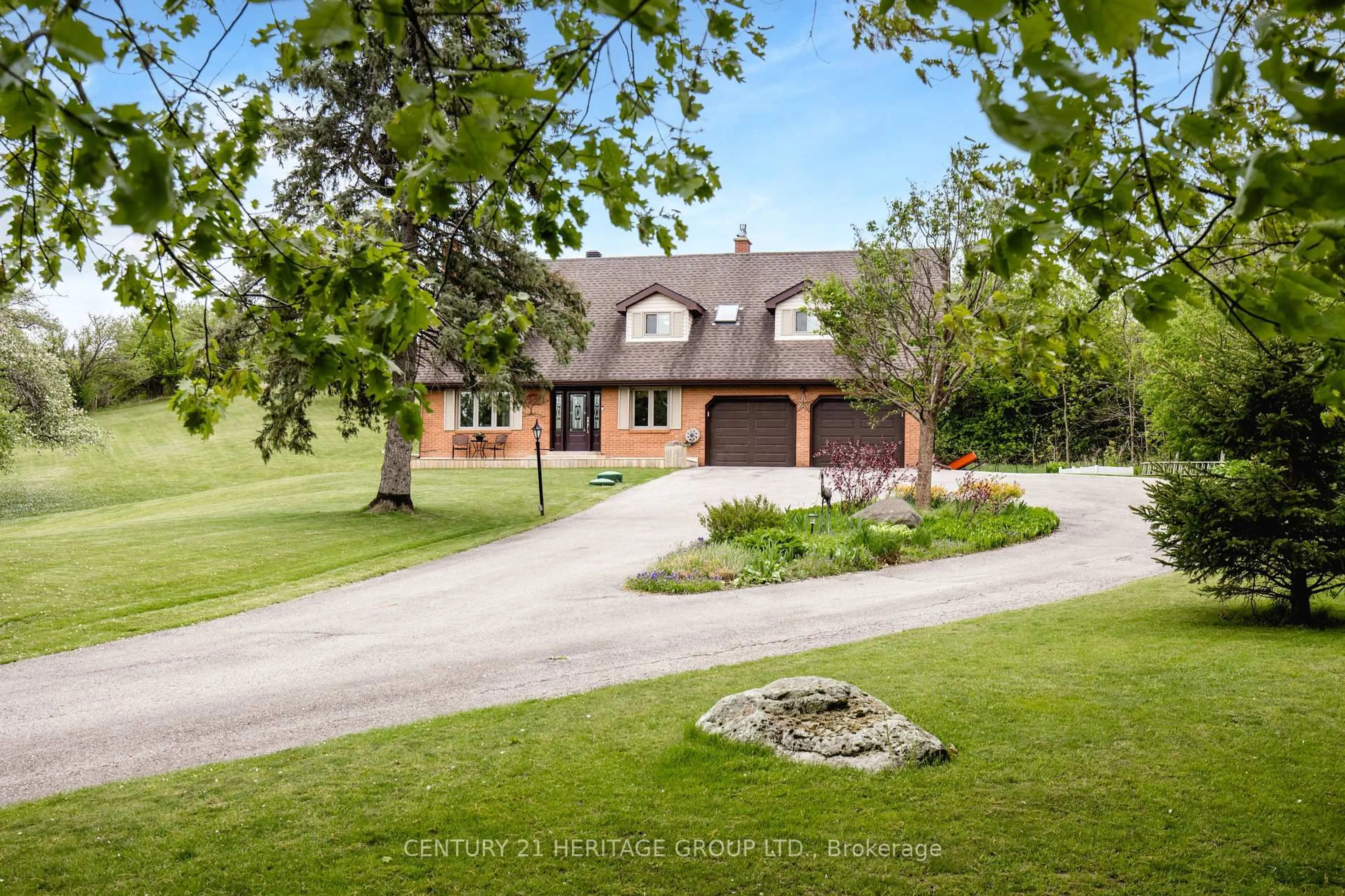 A pic from outside/outdoor area/front of a property/back of a property/a pic from drone, street for 5827 7th Line, New Tecumseth Ontario L0G 1A0