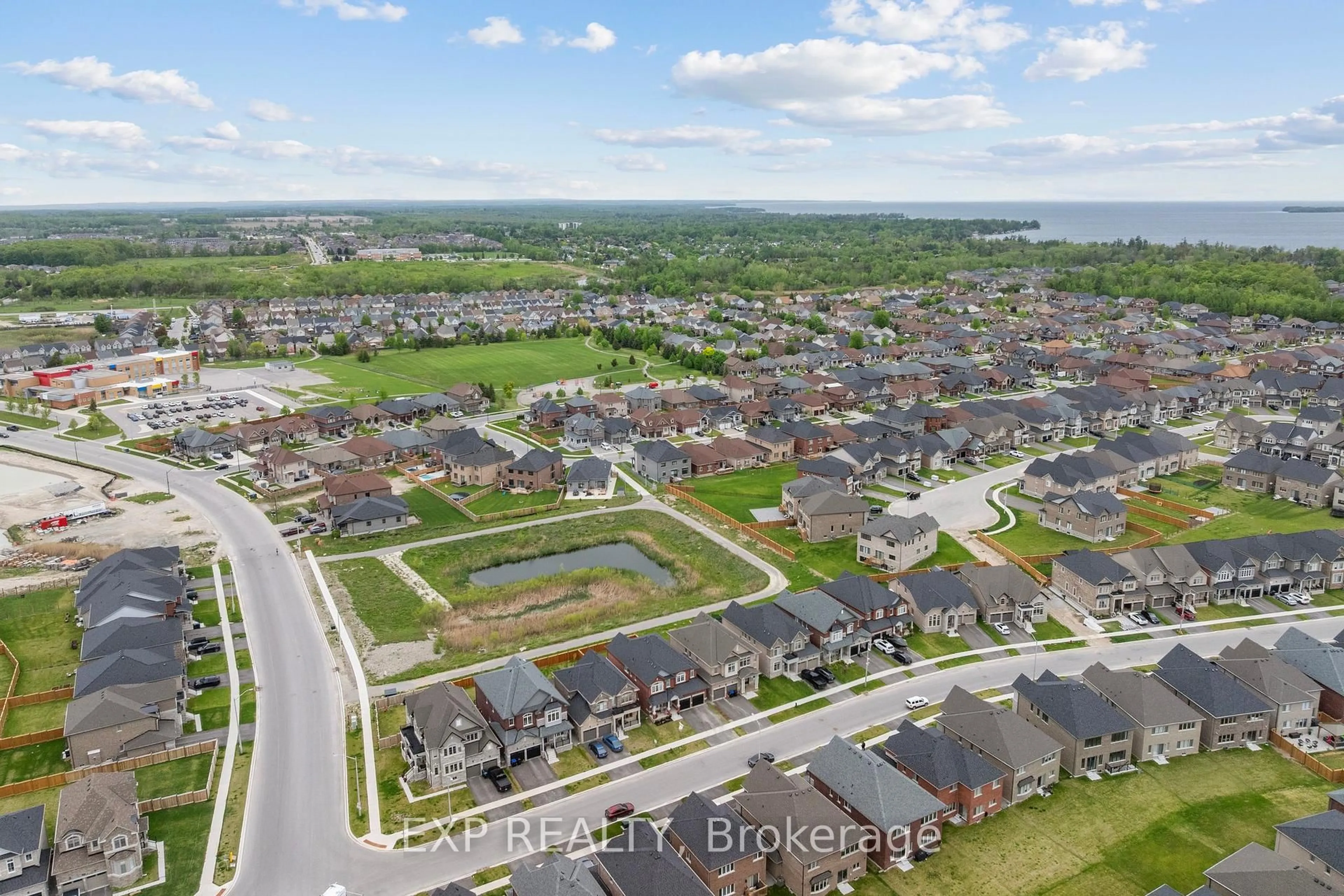 A pic from outside/outdoor area/front of a property/back of a property/a pic from drone, street for 1210 Wickham Rd, Innisfil Ontario L9S 0P9