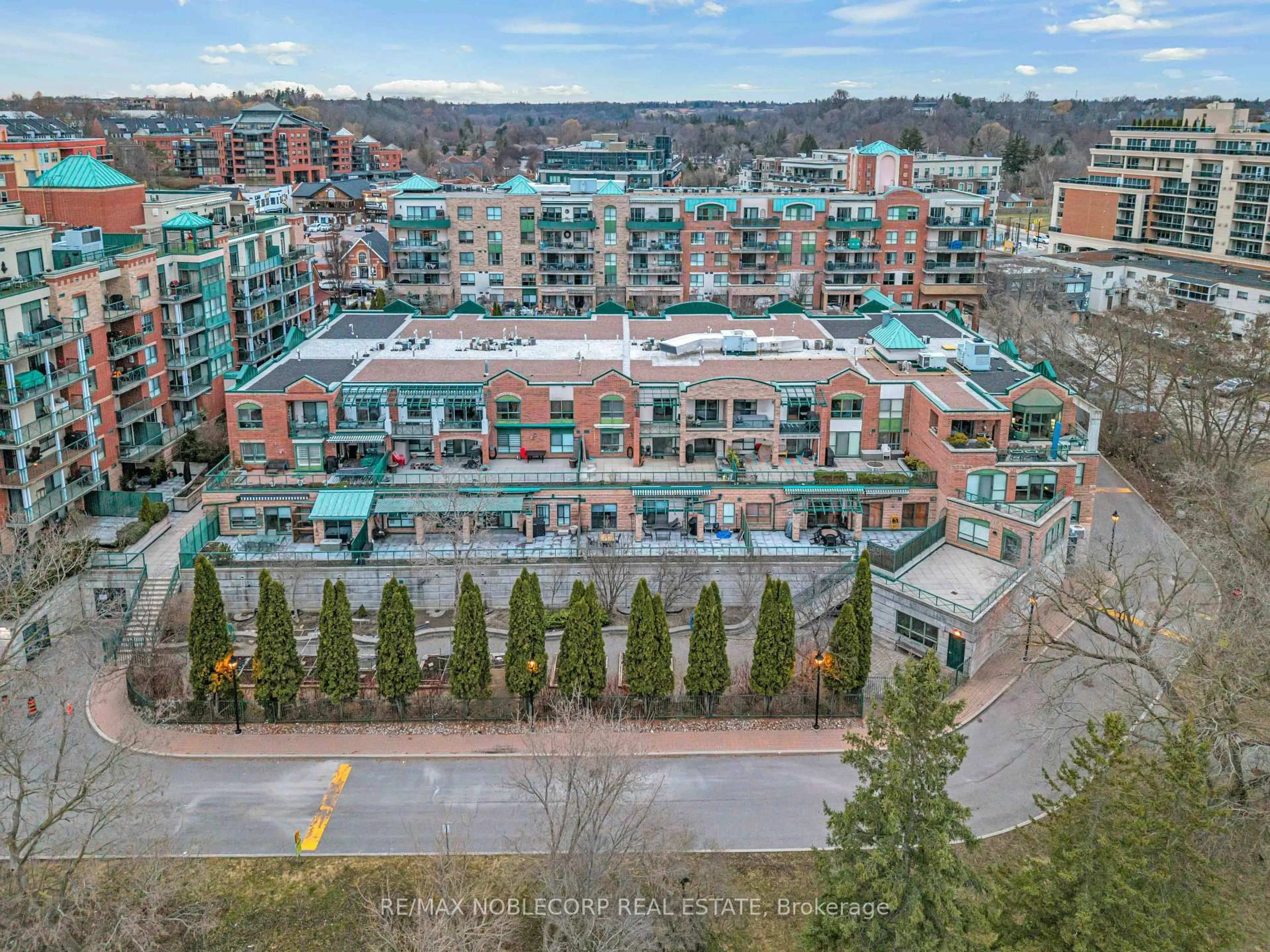 A pic from outside/outdoor area/front of a property/back of a property/a pic from drone, city buildings view from balcony for 121 Woodbridge Ave #319, Vaughan Ontario L4L 9E3