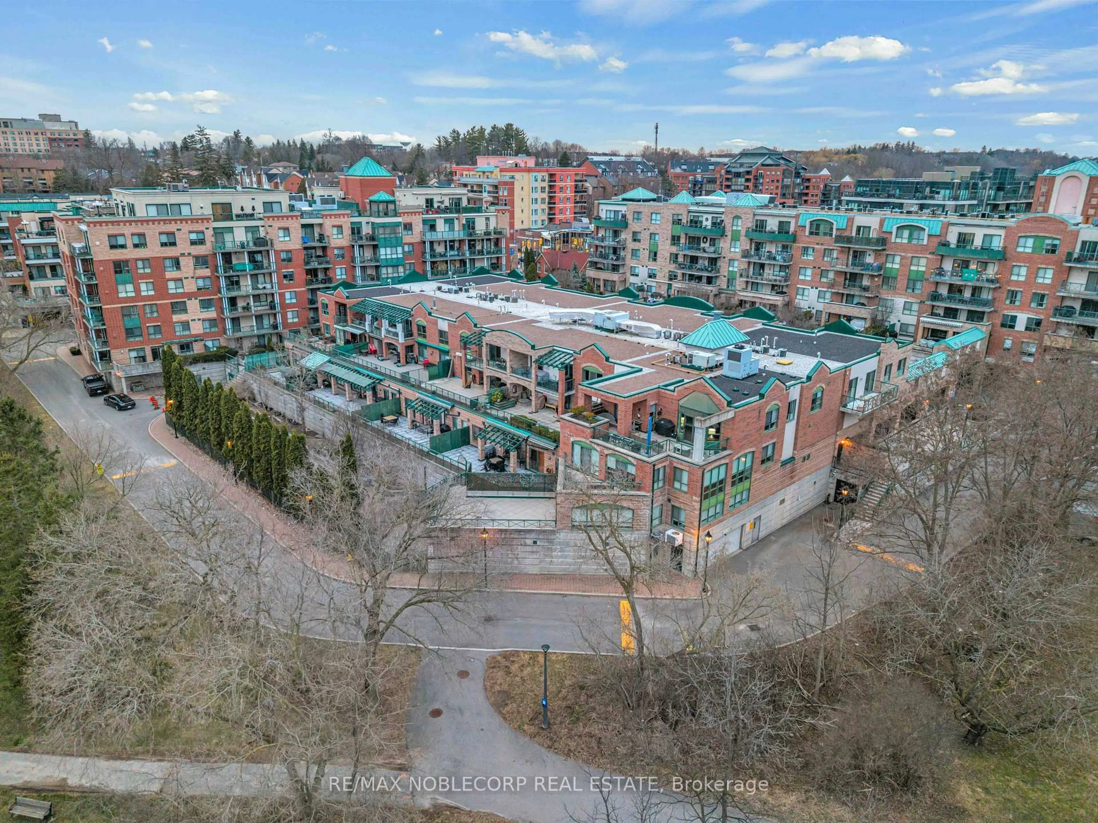 A pic from outside/outdoor area/front of a property/back of a property/a pic from drone, city buildings view from balcony for 121 Woodbridge Ave #319, Vaughan Ontario L4L 9E3