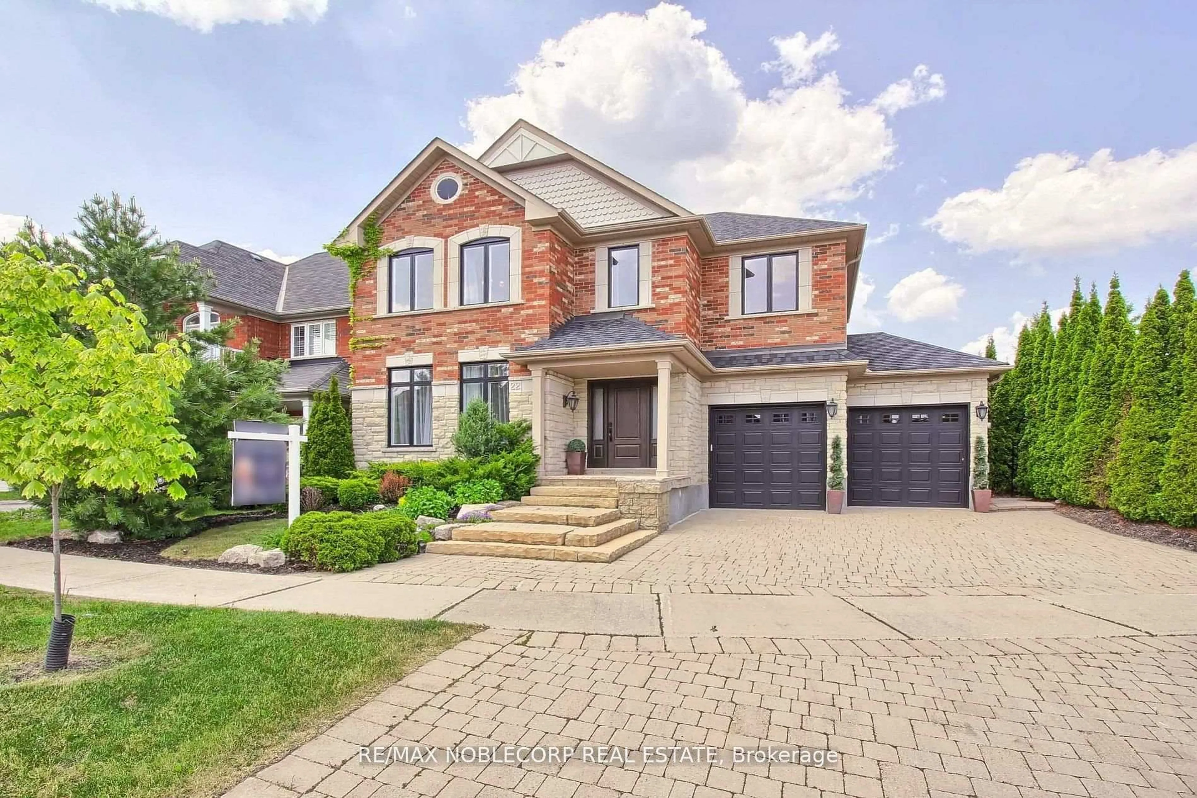 Home with brick exterior material, street for 22 Escapade Dr, Richmond Hill Ontario L4E 4X7