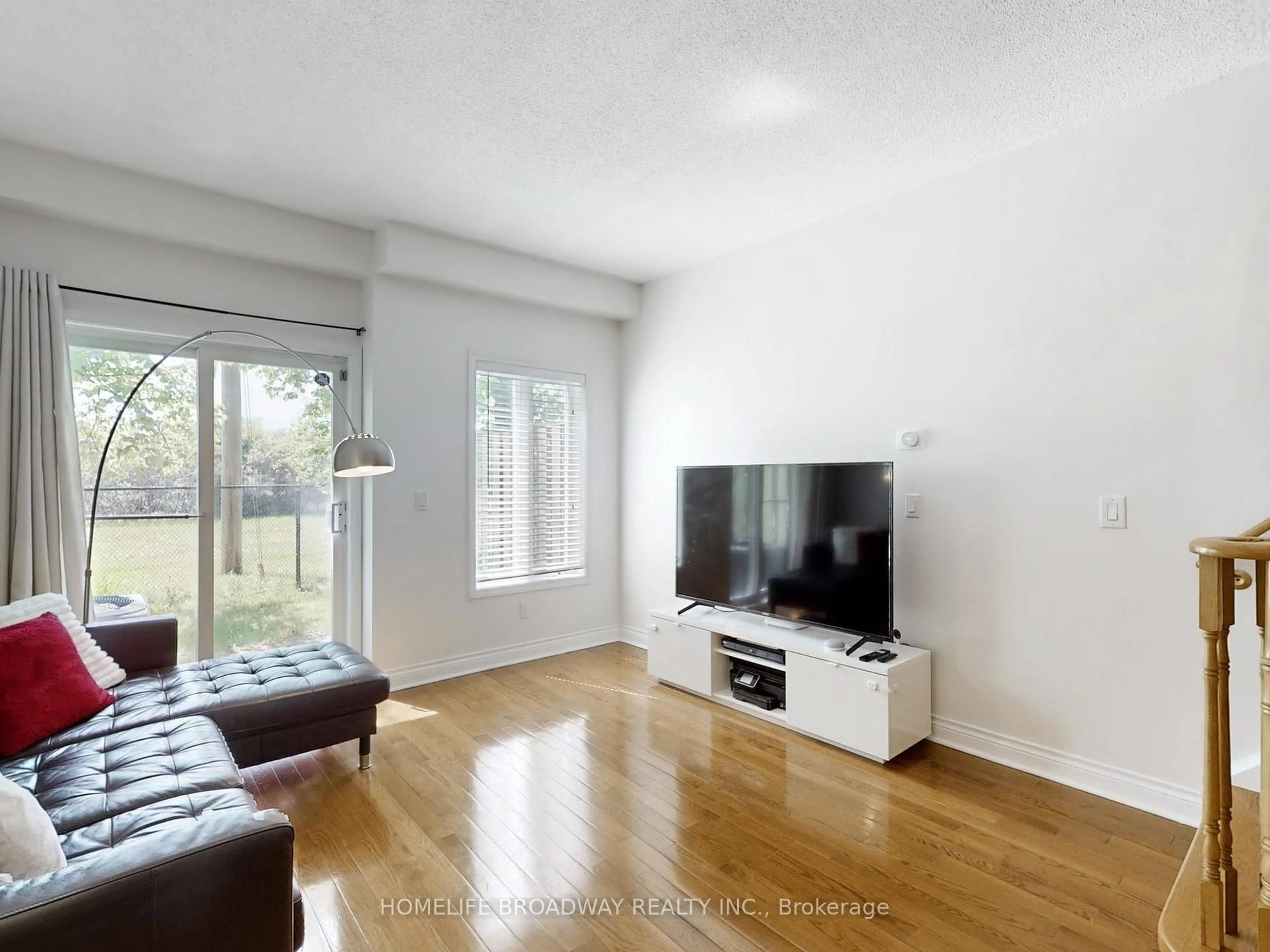 Living room with furniture, wood/laminate floor for 8 St Moritz Way #3A, Markham Ontario L3R 4E8