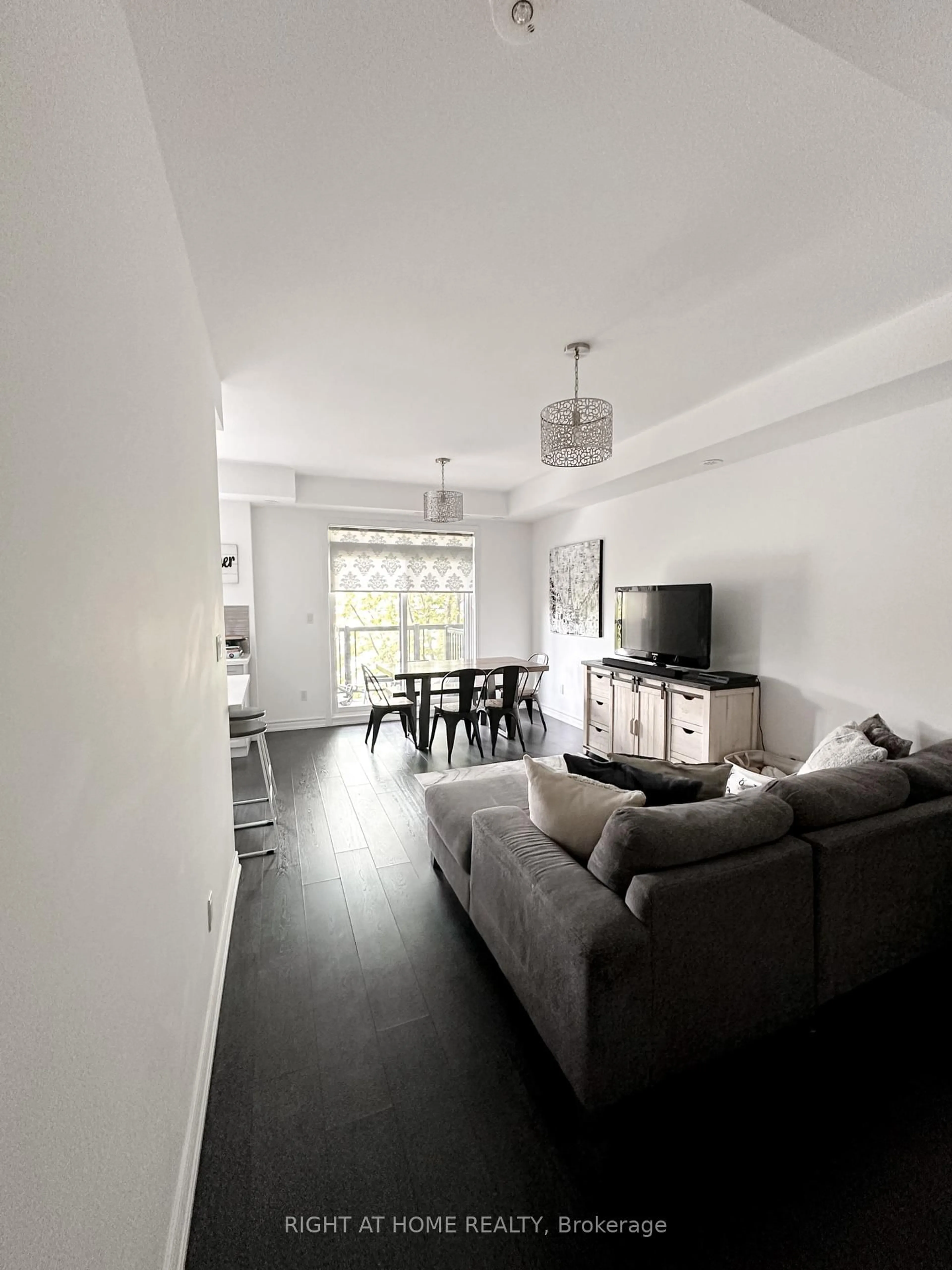 Living room with furniture, unknown for 201 Pine Grove Rd #423, Vaughan Ontario L4L 0H8