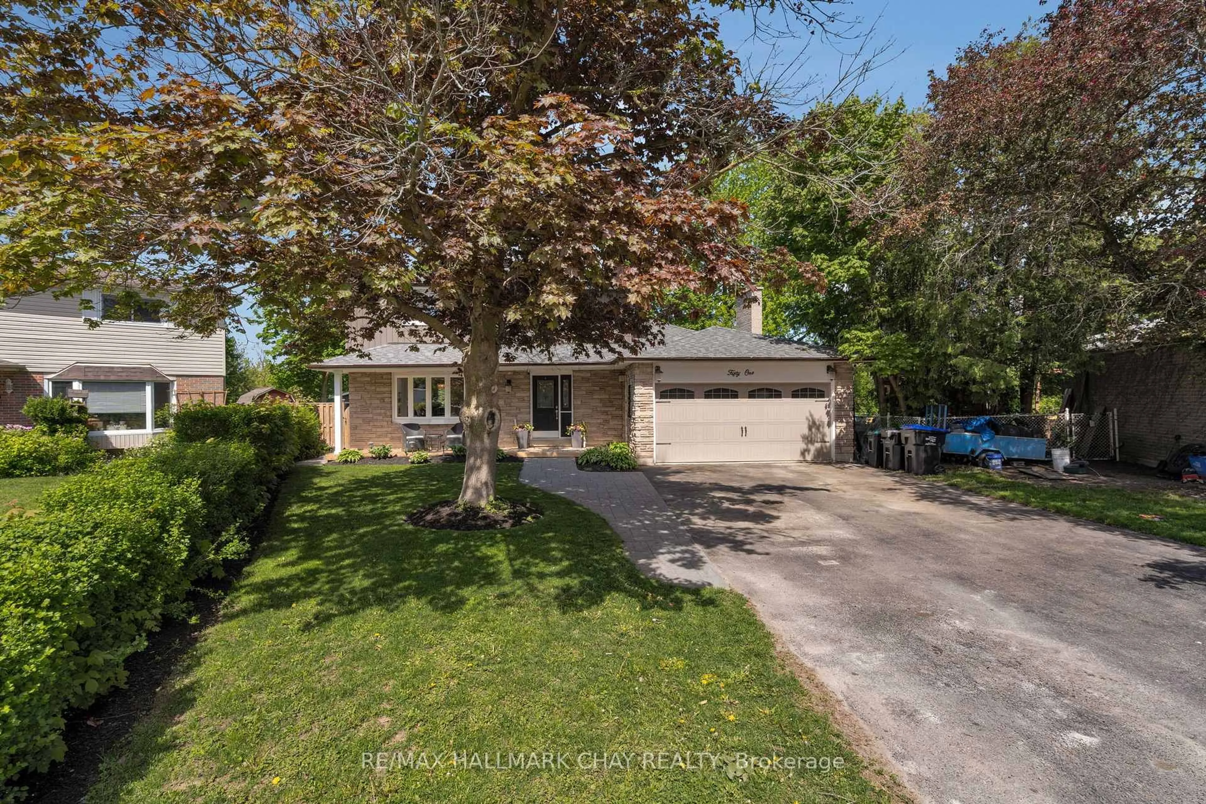 A pic from outside/outdoor area/front of a property/back of a property/a pic from drone, street for 51 Adeline Ave, New Tecumseth Ontario L0G 1W0