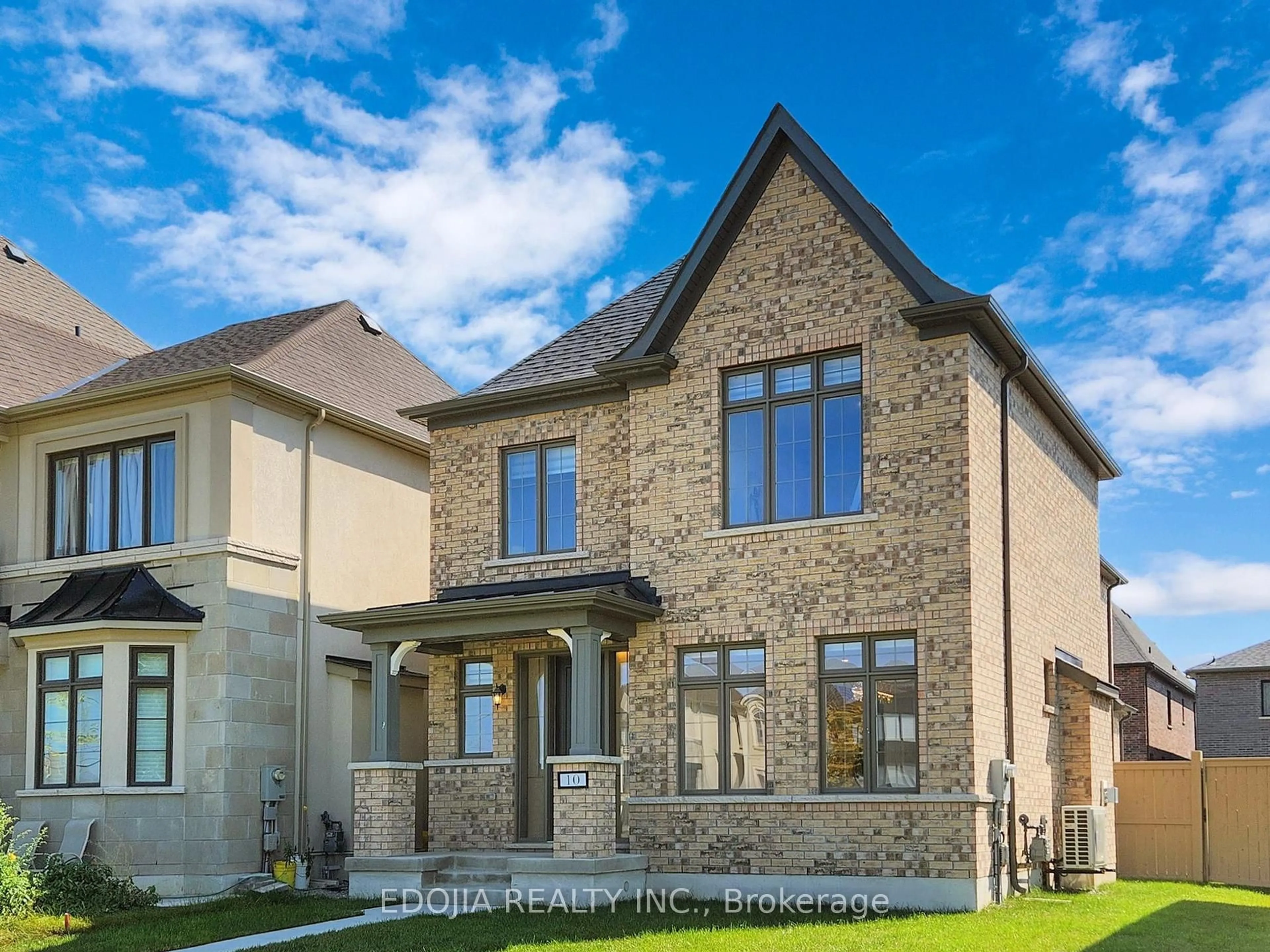 Home with brick exterior material, street for 10 Pevensey Lane, Markham Ontario L6C 3J2