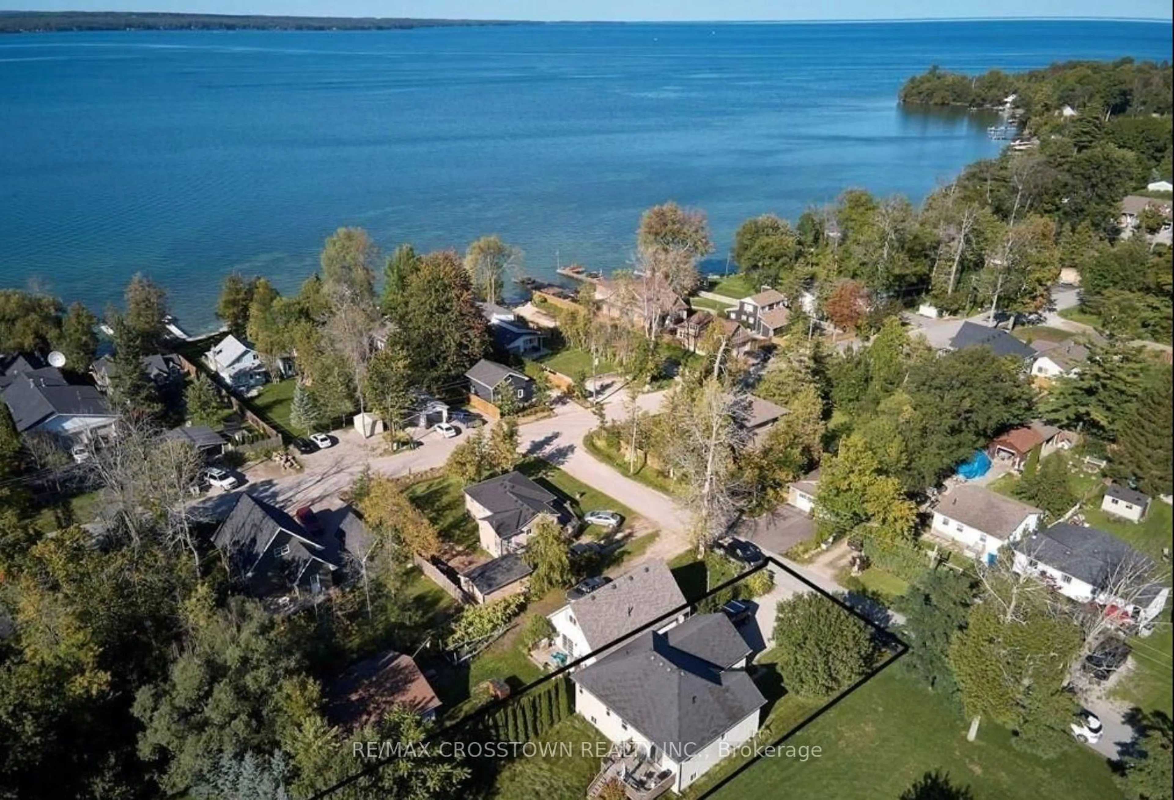 A pic from outside/outdoor area/front of a property/back of a property/a pic from drone, water/lake/river/ocean view for 3964 Alcina Ave, Innisfil Ontario L9S 2M1