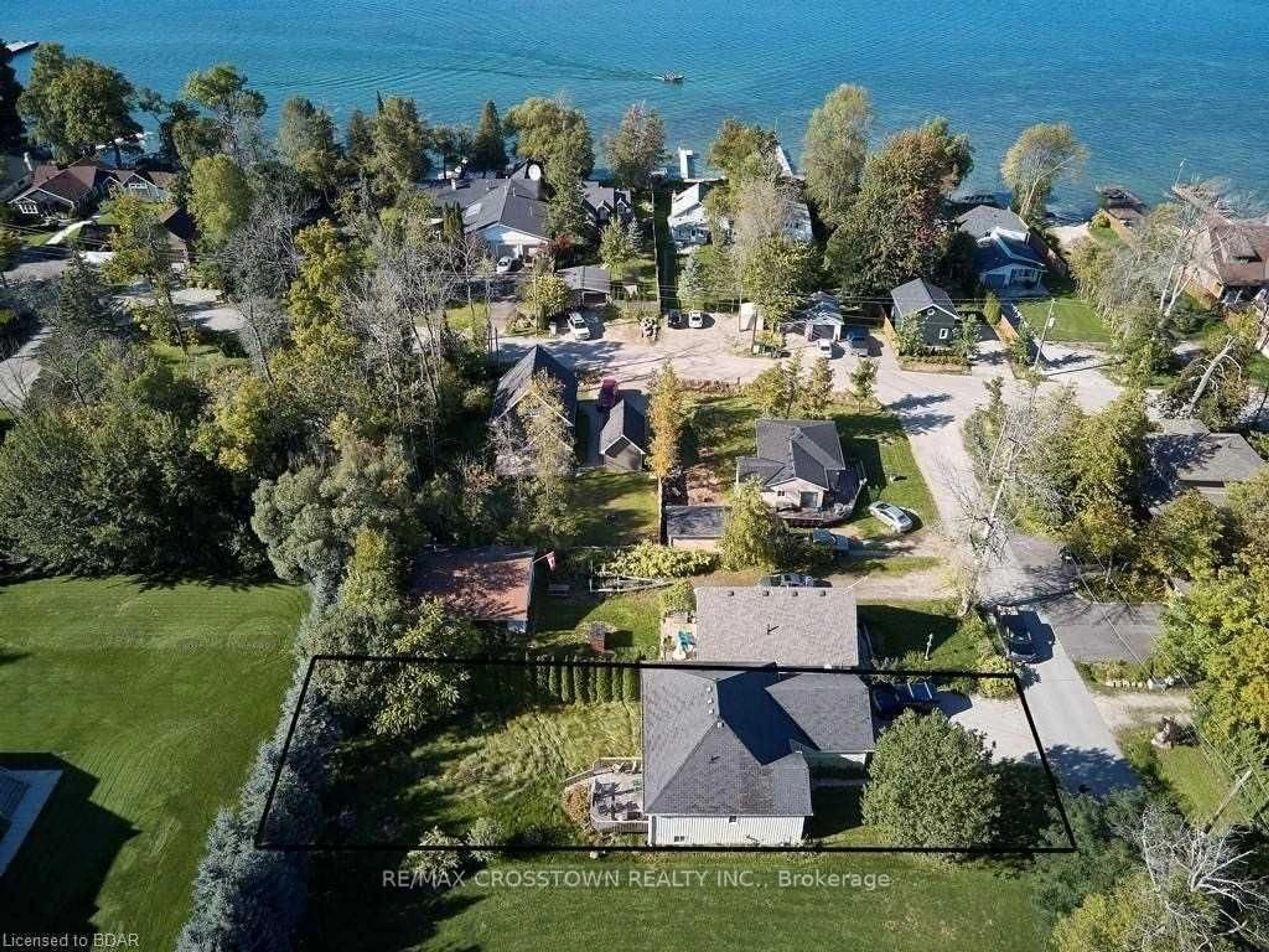 A pic from outside/outdoor area/front of a property/back of a property/a pic from drone, water/lake/river/ocean view for 3964 Alcina Ave, Innisfil Ontario L9S 2M1